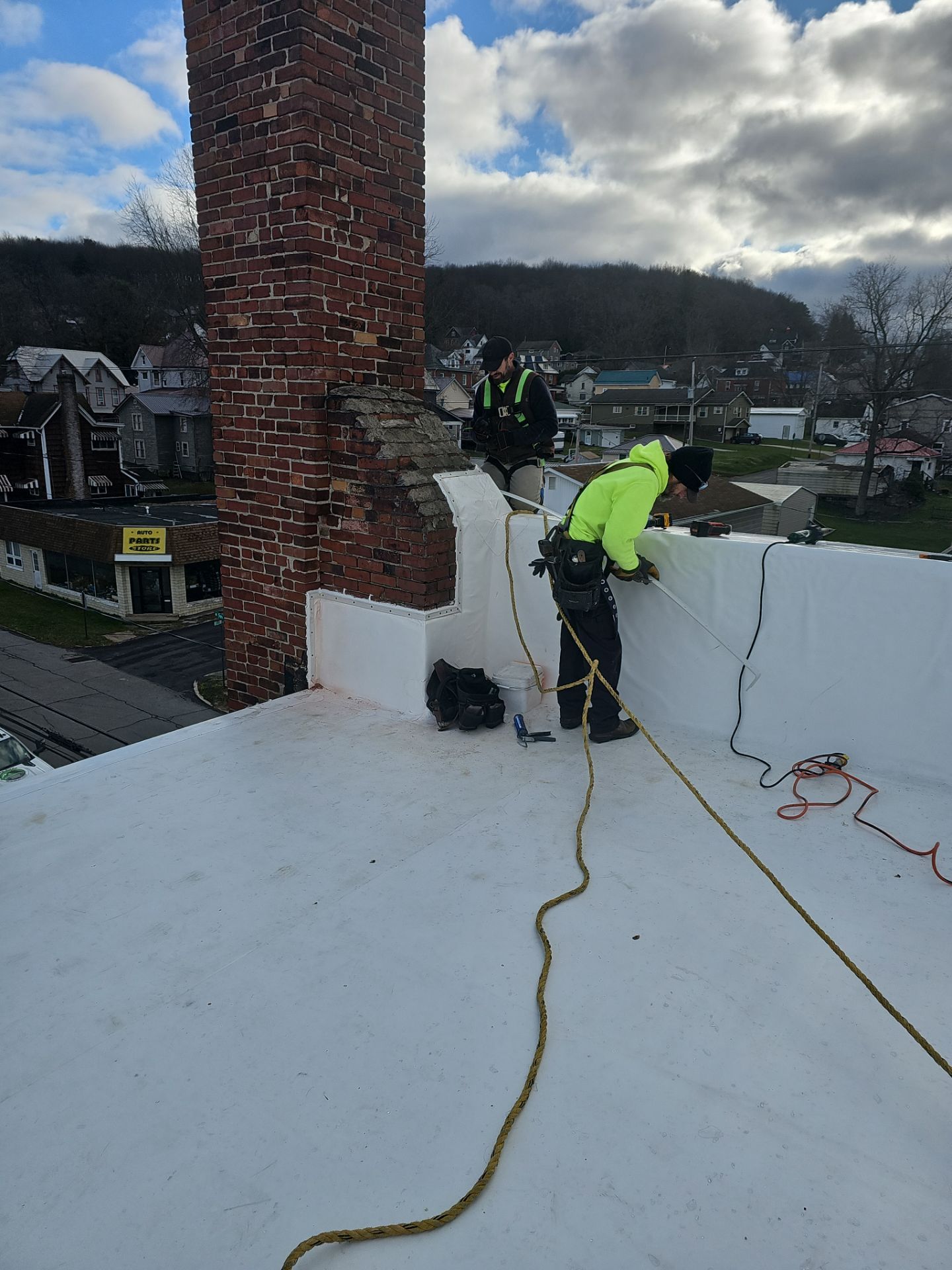 Western Auto  by 768 ROOF, LLC.