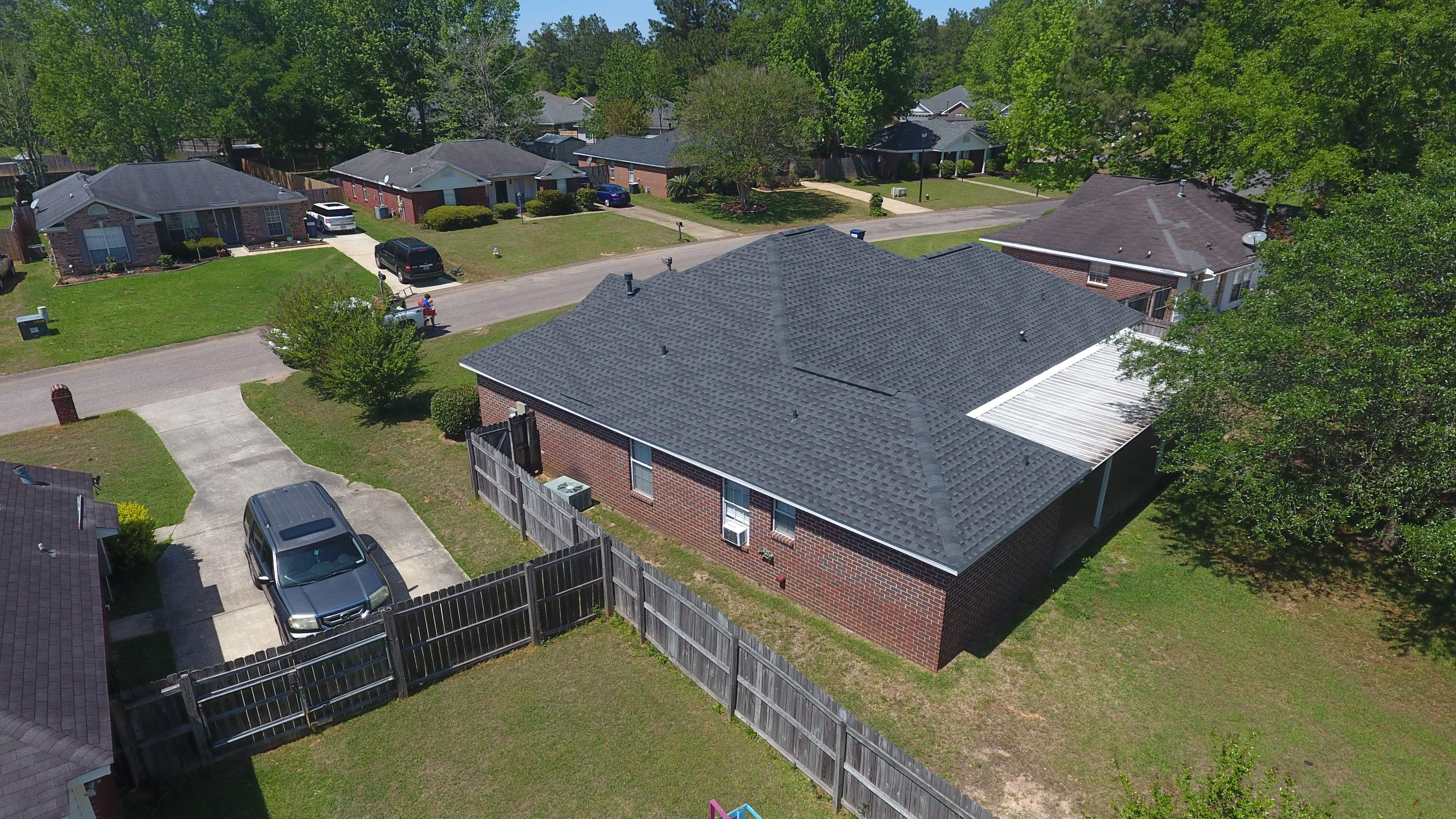 Residential Roofing Installation using Roof Replacement by American Roofing & Construction LLC