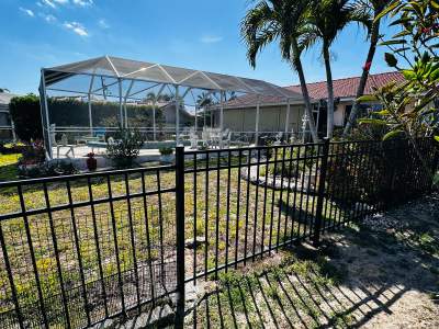 Waterfront Aluminum Picket Fence Installation in Punta Gorda
