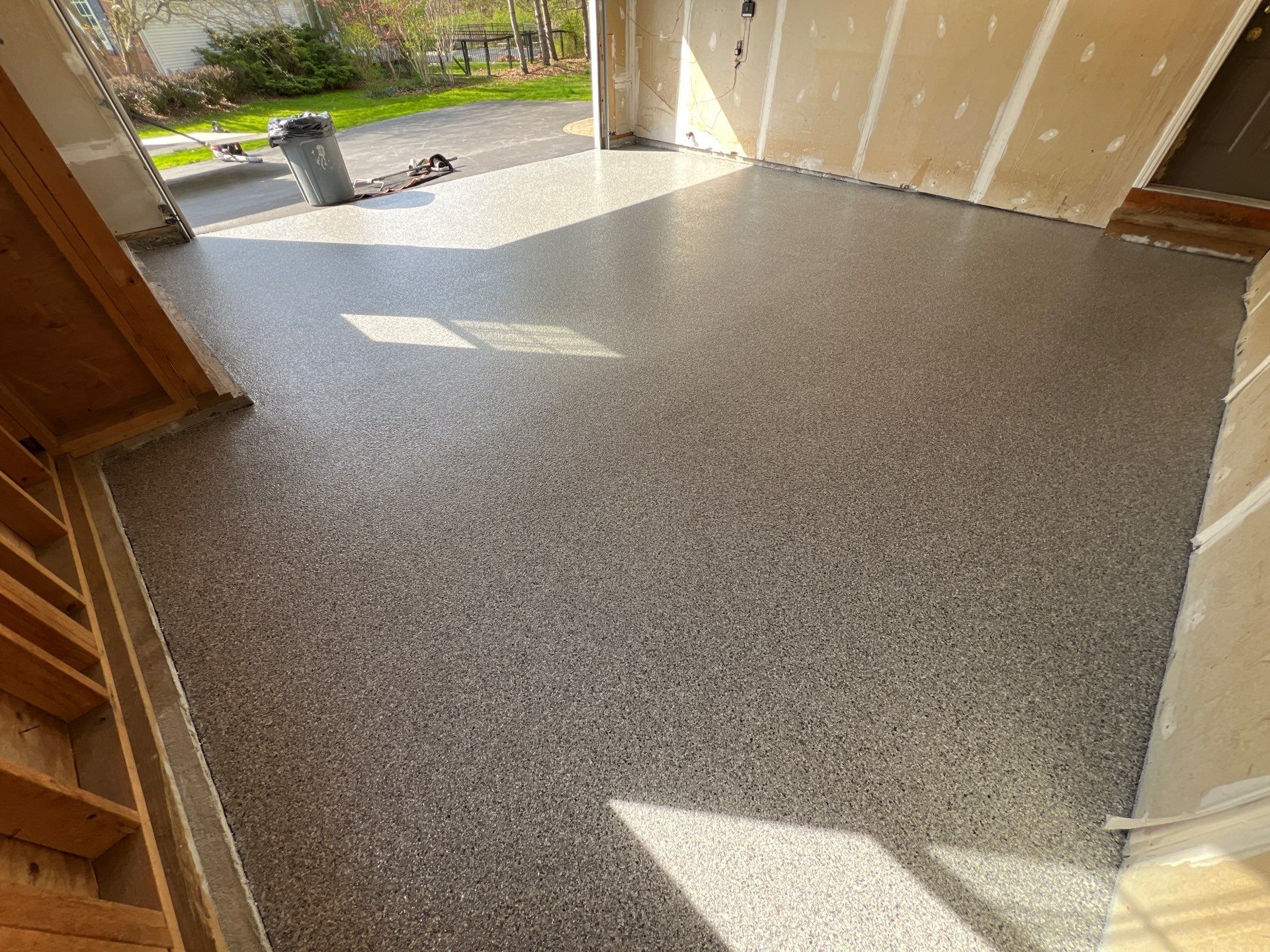 Silverado garage floor coating  by NG Masonry & Construction LLC