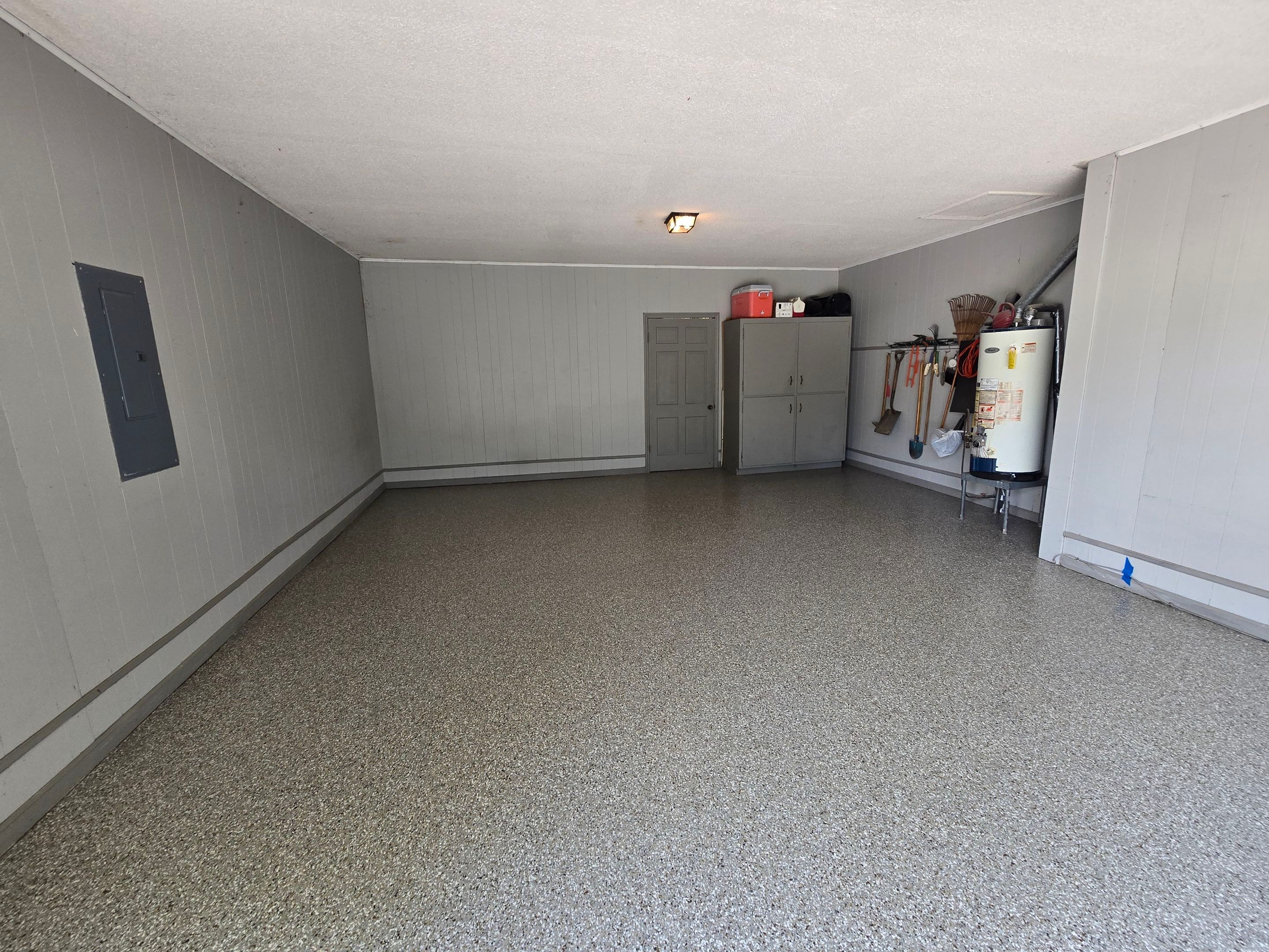 Front Porch & Garage Using Creekbed by Elite Floor Solutions
