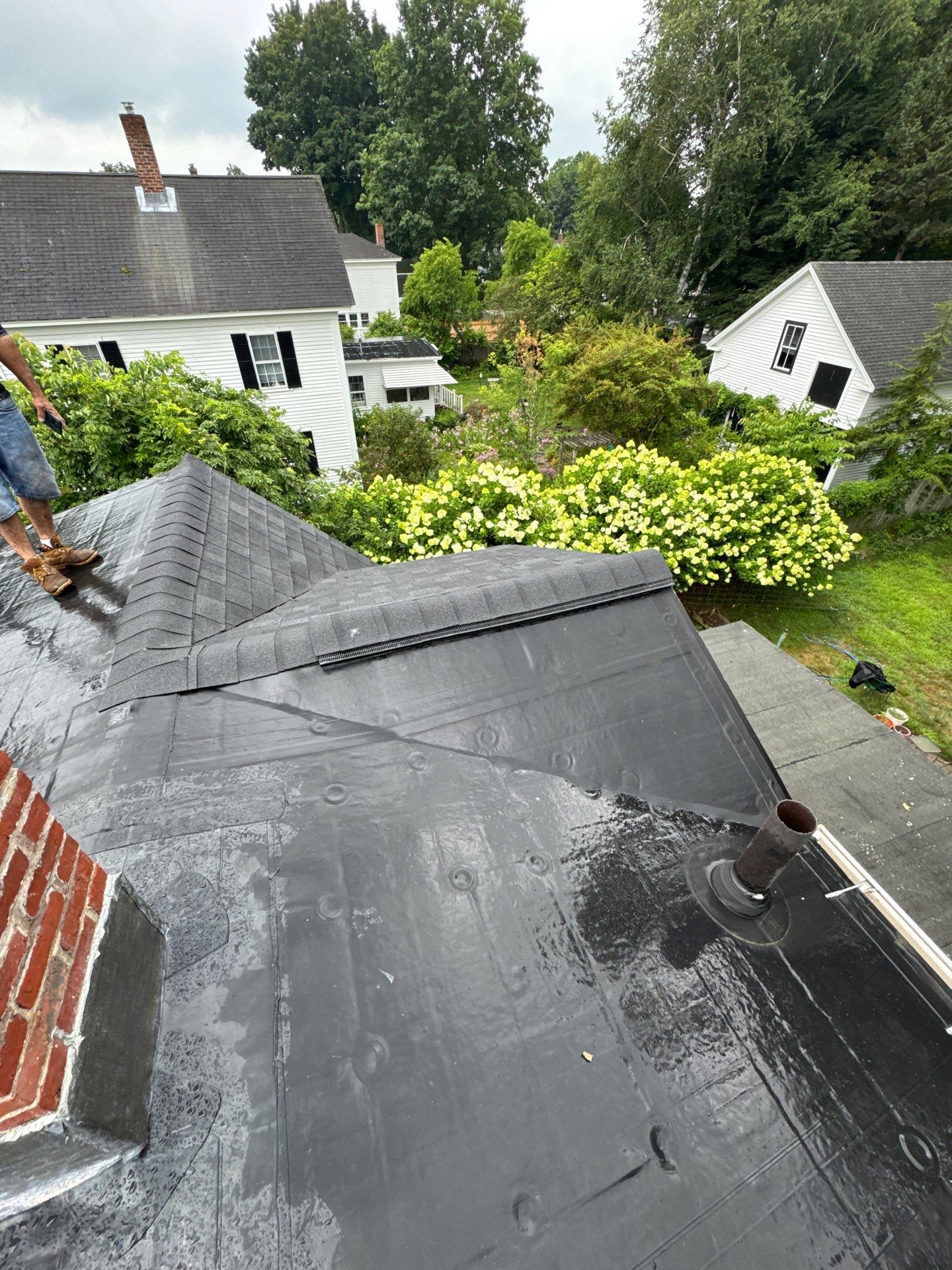Full Roof Replacement + Custom Gutter Install | Onyx Black Finish by Mighty Dog Roofing of Greater Middlesex County