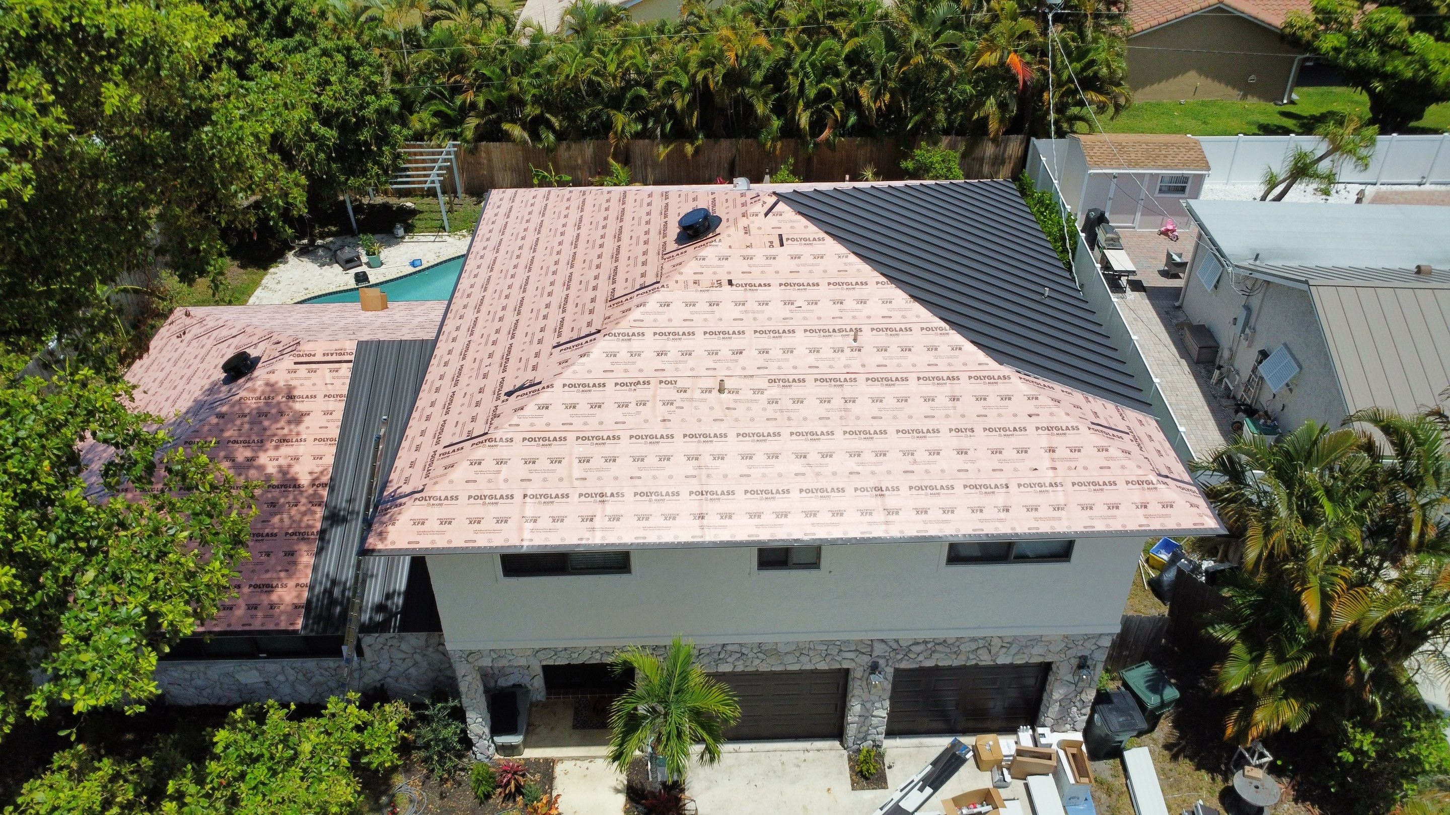 Residential Roofing Installation using 1.5'' Mechanical Seam by BLUES BROTHERS ROOFING