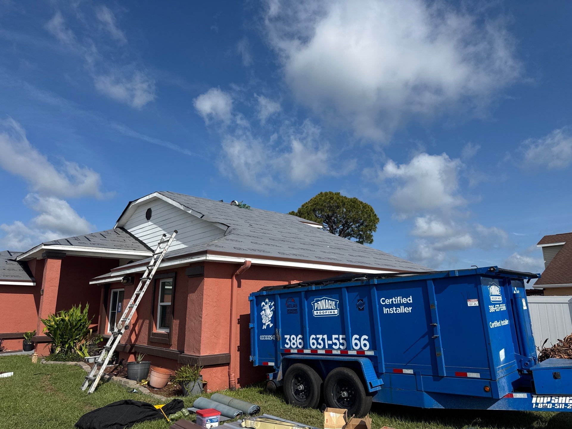 Residential Metal Roofing Installation and Gutter Replacement in Kissimmee by Pinnacle Roofing Group