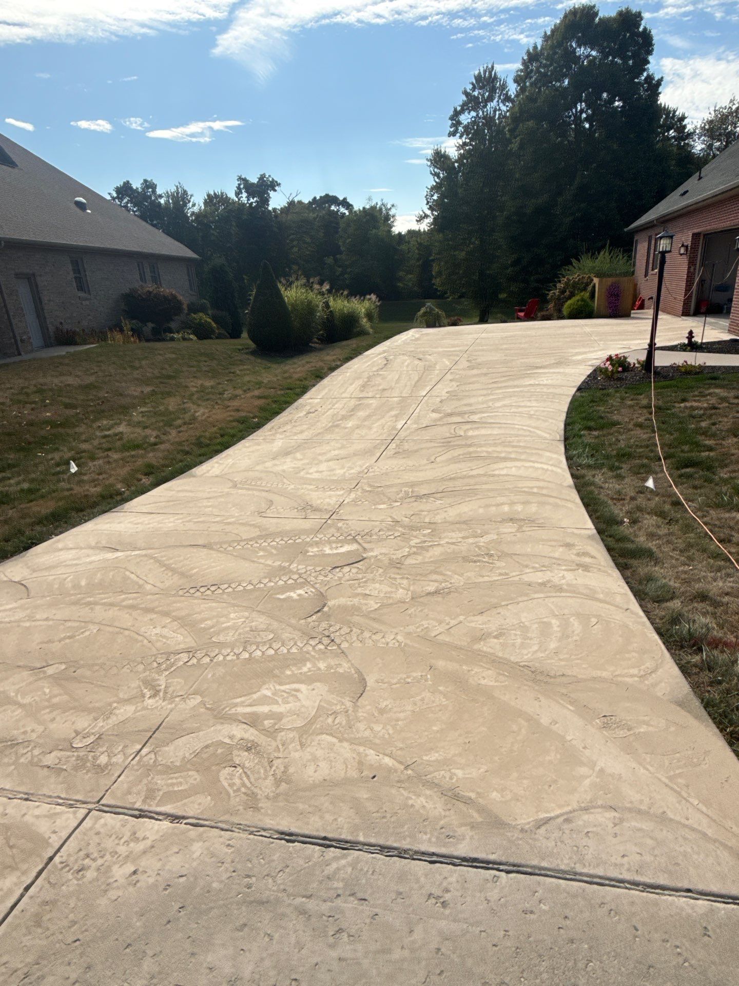 Driveway + Garage + Walkway Project in Meridian by Floors in a Day, Inc