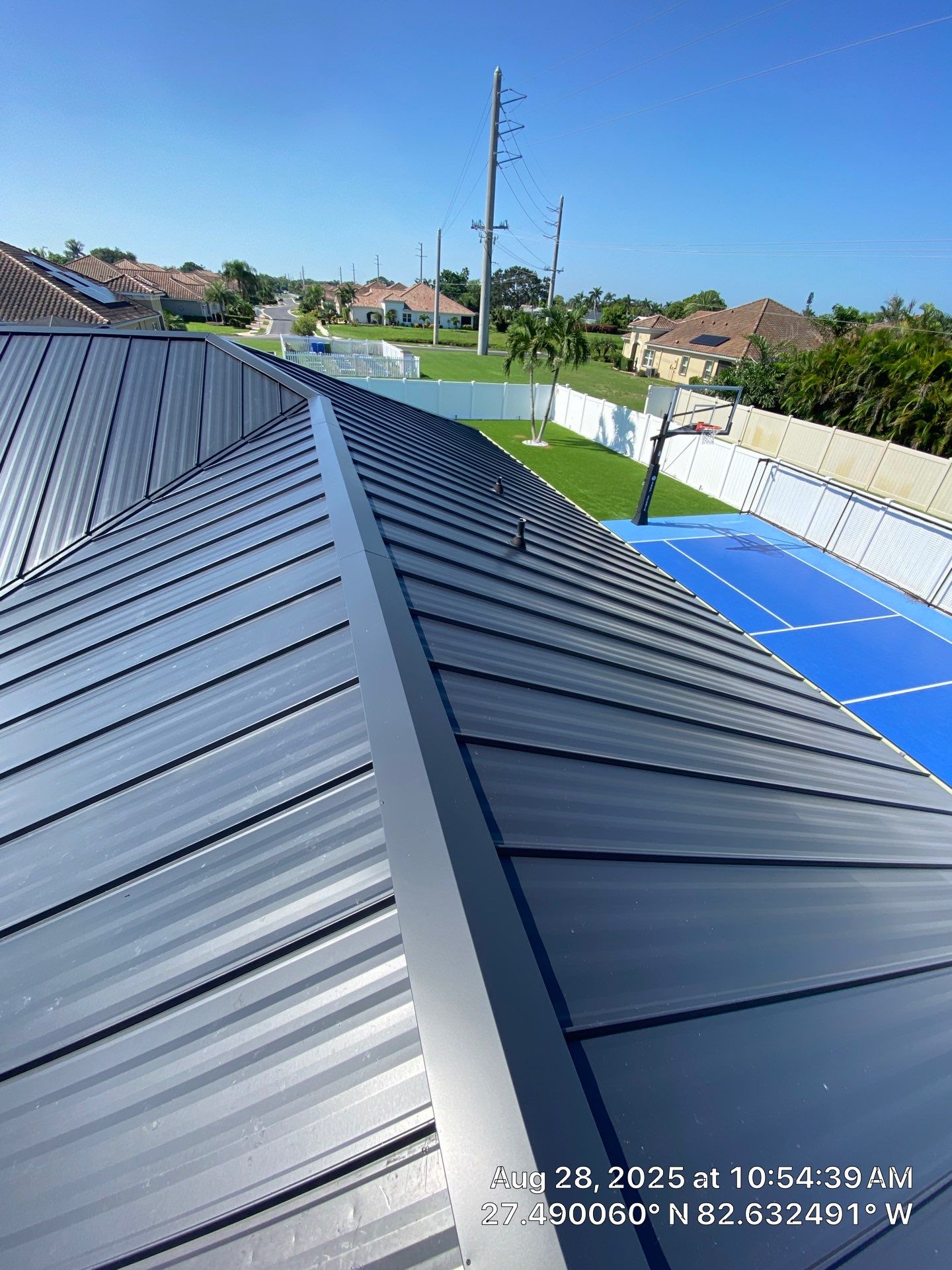 Metal Roofing System by Rooster Roofing, LLC
