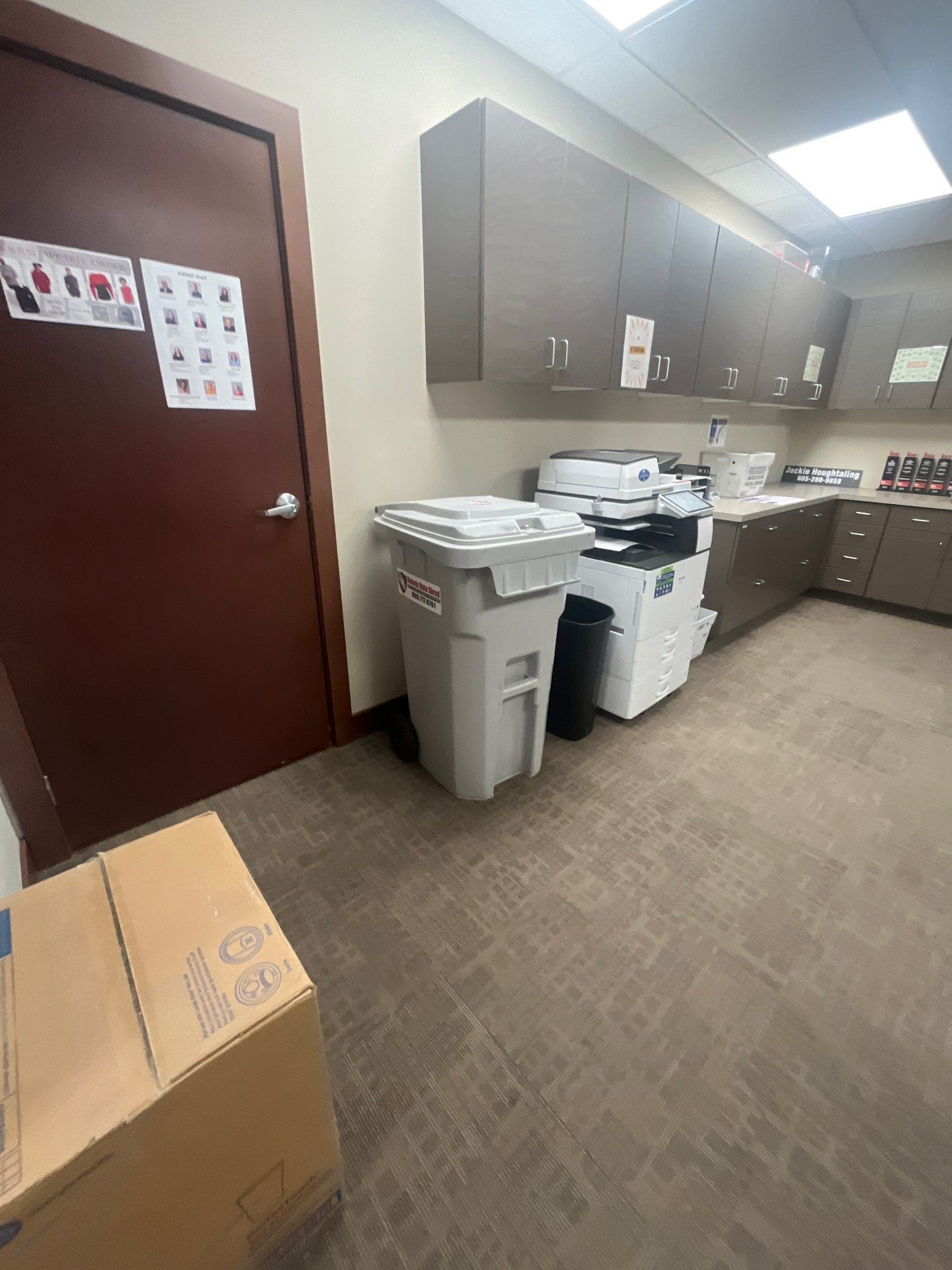 Commercial Office Interior Remodel and Modern Suite Refresh in Sioux Falls by Select Painting, Coatings & Garage Cabinets