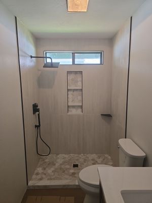 Full Interior Renovation Featuring Custom Tile Shower and Fireplace in Brookings