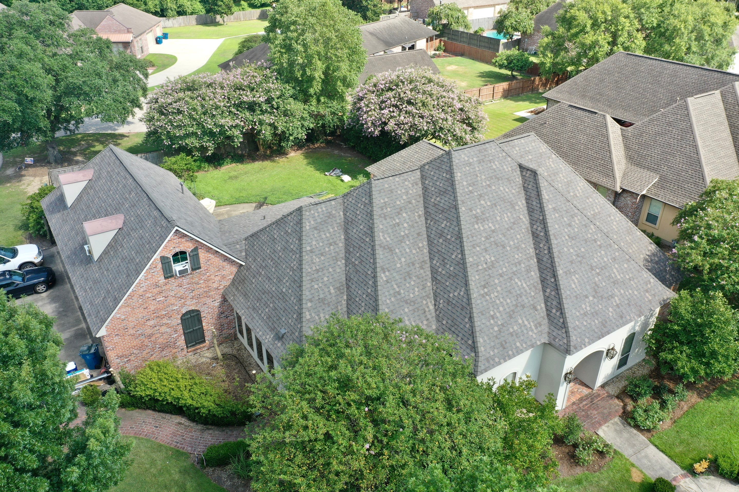 Storm Master Shake Weathered Wood with High profile Ridge Cap by Top Team Roofing & Construction