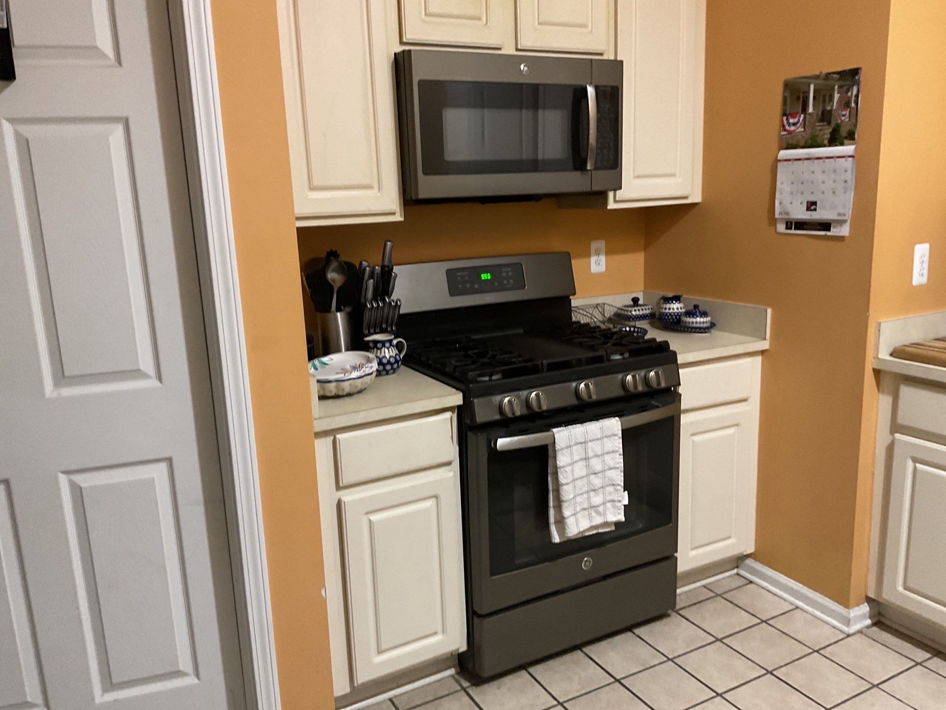 Modern Navy Blue Cabinet Refacing with Quartz countertop replacement in Harrison Township by Top Shelf Painter