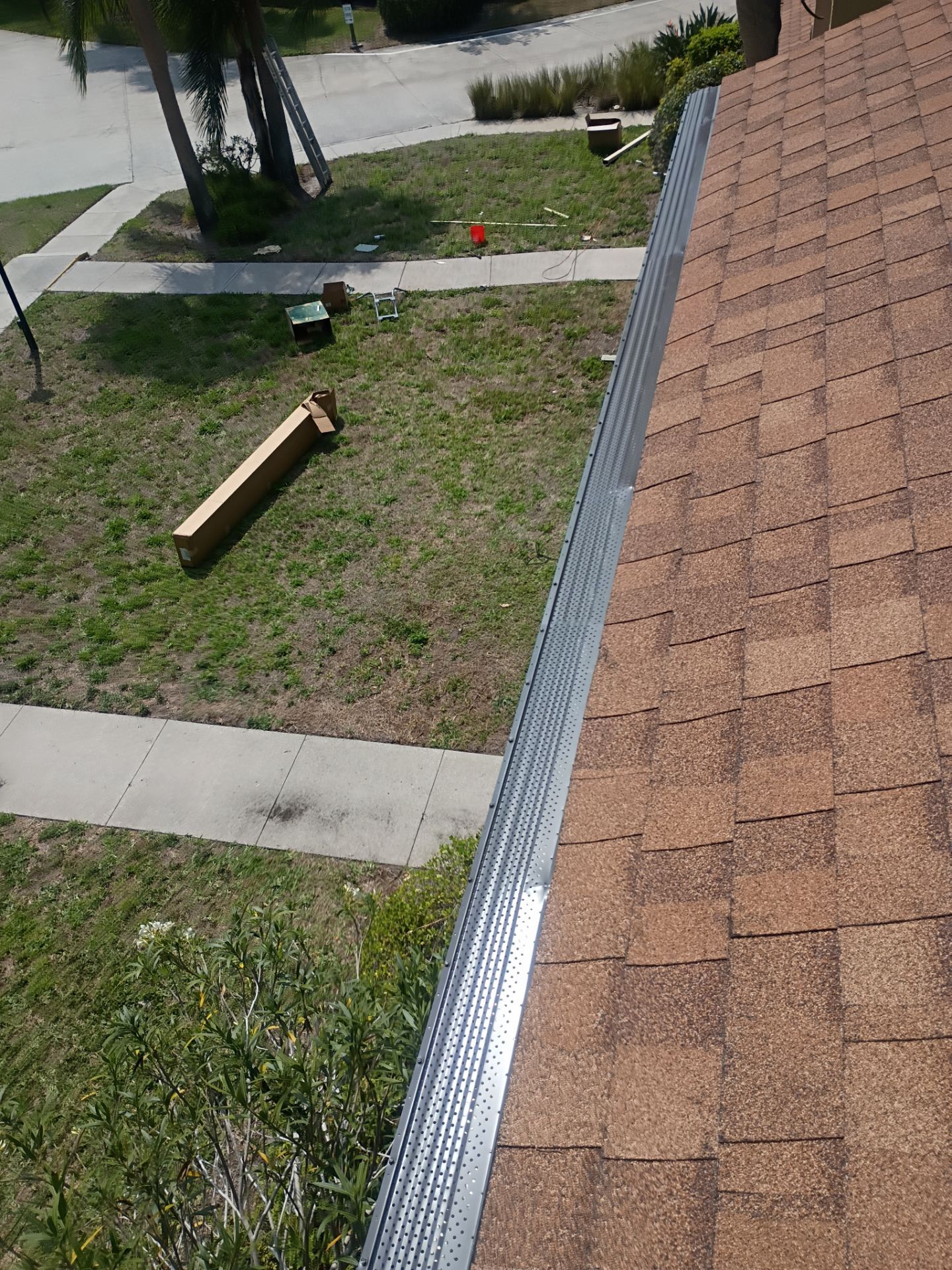 Leaf Guard using Gutter Guards & 3X4Downspoutsts in Sarasota FL by Gutter Professors