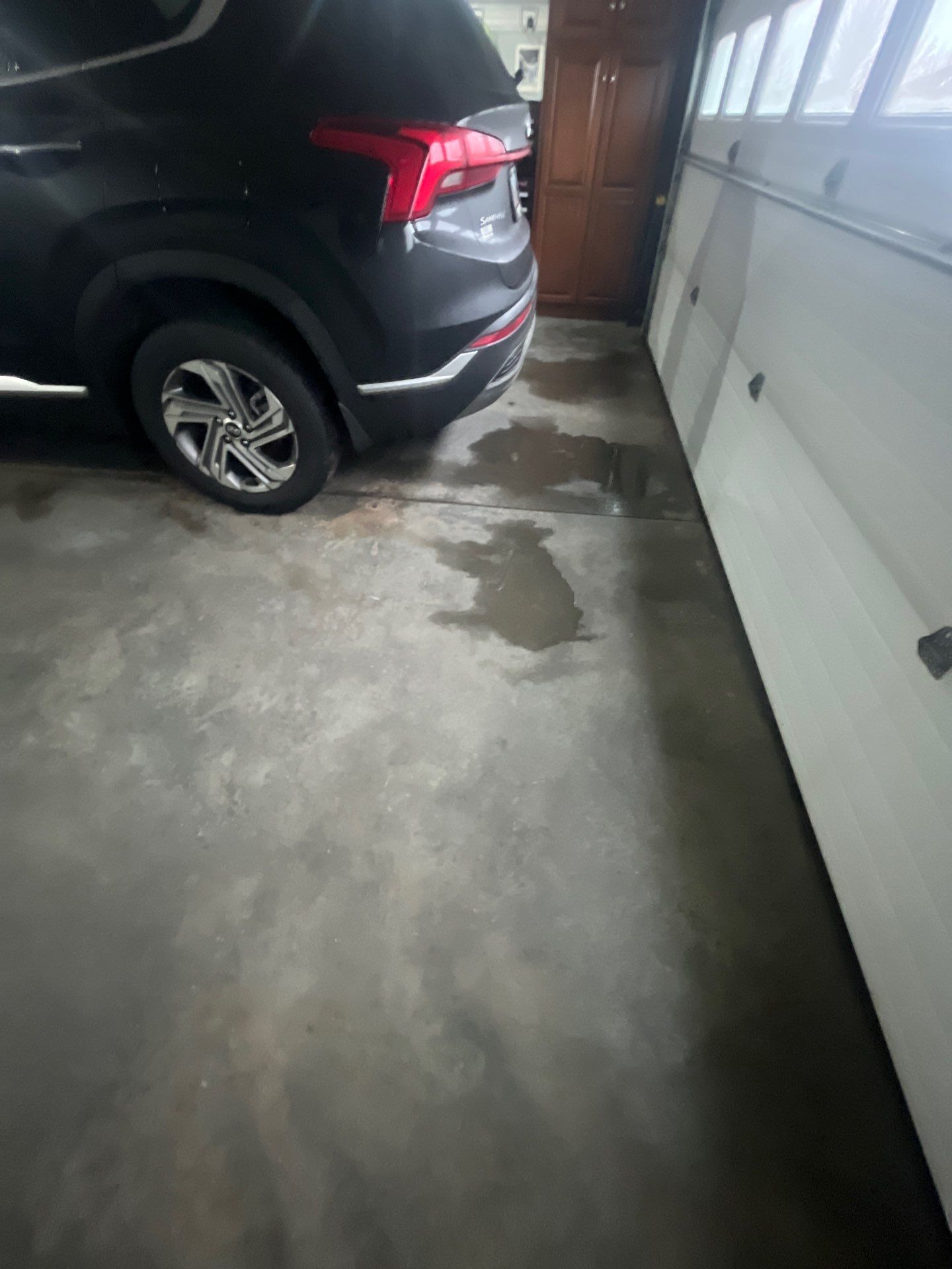 High-Gloss Epoxy Garage Floor Coating in Sioux Falls by Select Painting, Coatings & Garage Cabinets