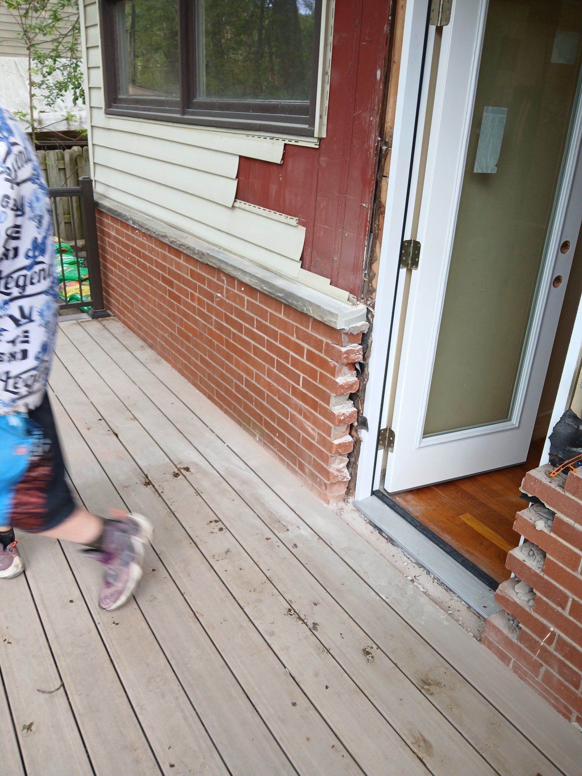 Deck and door install by Cousins Roofing Siding & Decks