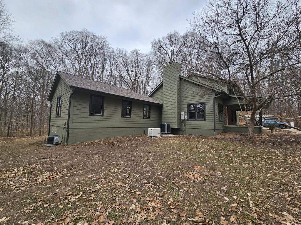 Siding Installation using Primed James Hardie & Straight Edge Shakes by Koontz Construction
