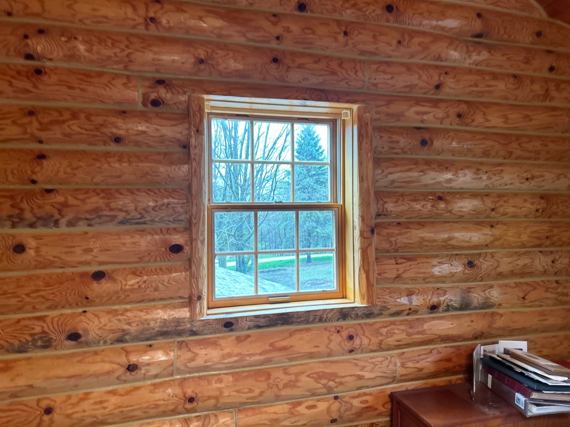Pella Window installation using Pella Lifestyle wood/Aluminum window by United Windows and Siding LLC