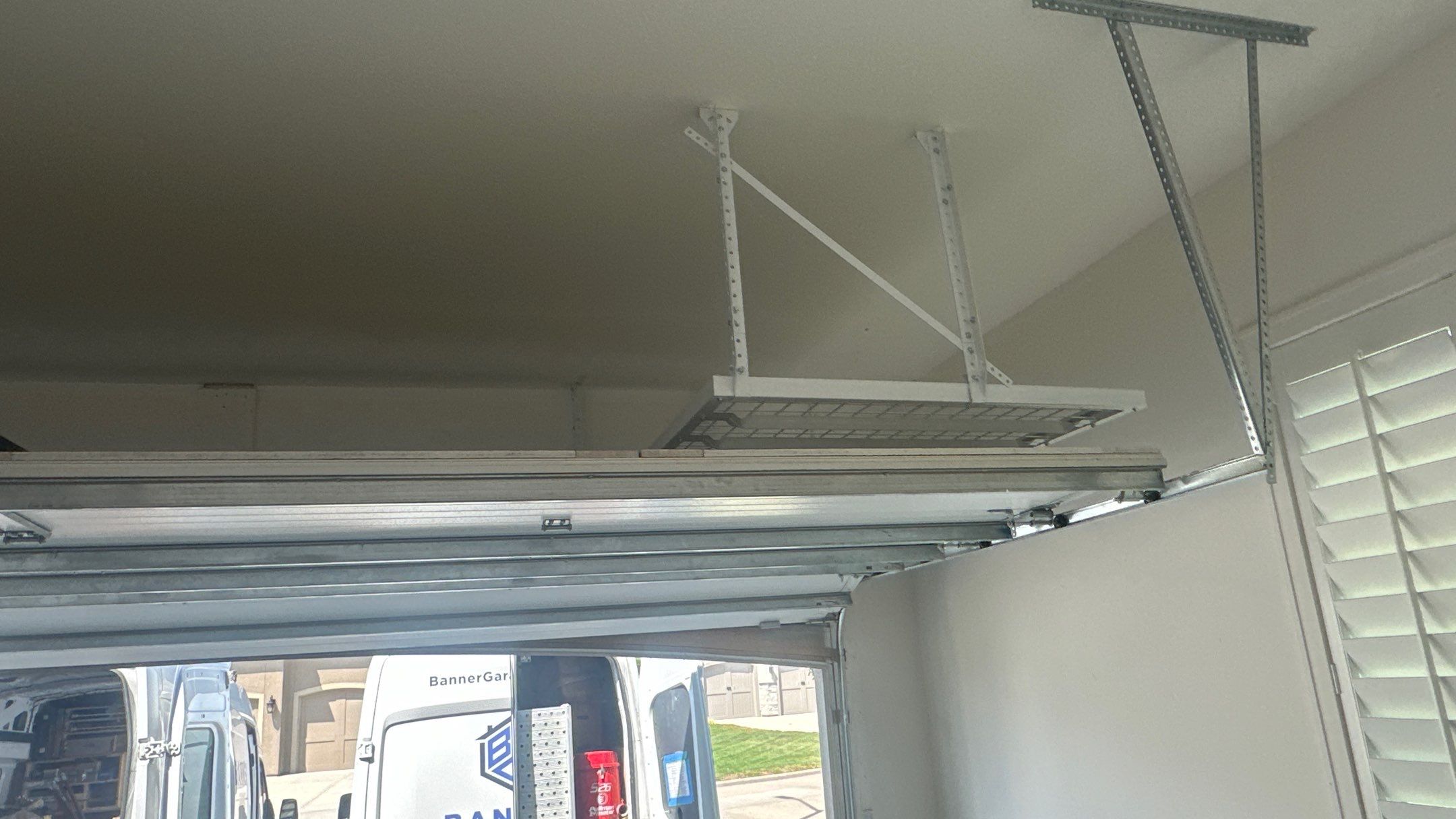 New bike storage for Jason E. along with some overhead racks  by Banner Garage