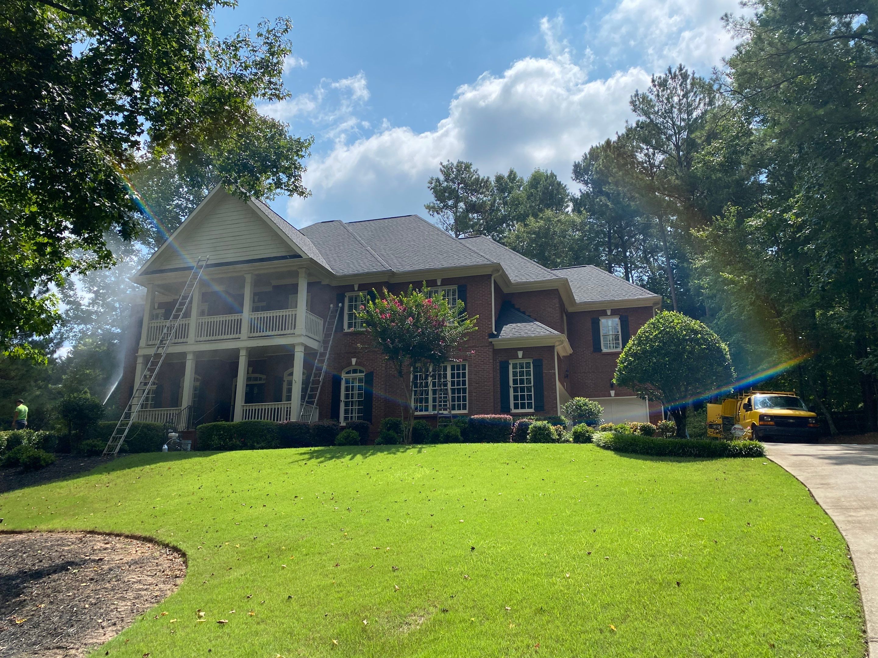 Exterior Trim and Garage Door Painting for Alpharetta Brick Home by Swift Home Renovations