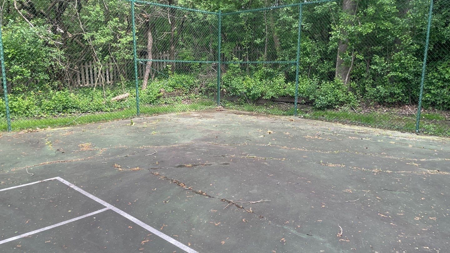 Tennis Court using Algaecide, soft wash soap by Northern Power Washing LLC.