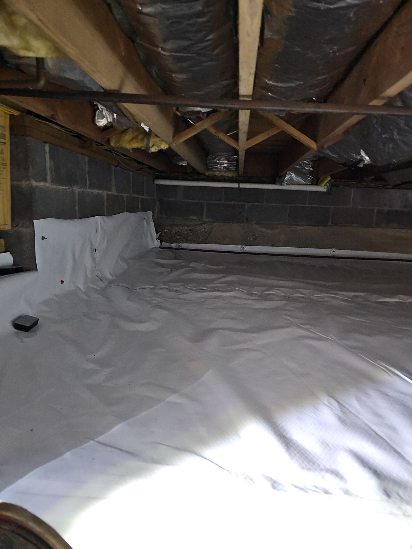 Basement Exterior Walls using Crawl Space Liner by NYS Foam & Energy