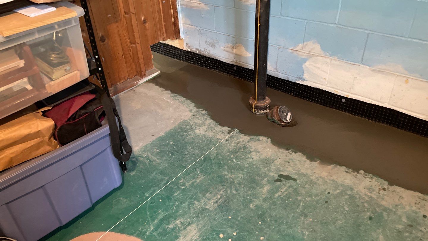 Completing the Connection for Lisa's Drain Tile System by Waterproofing Northeast