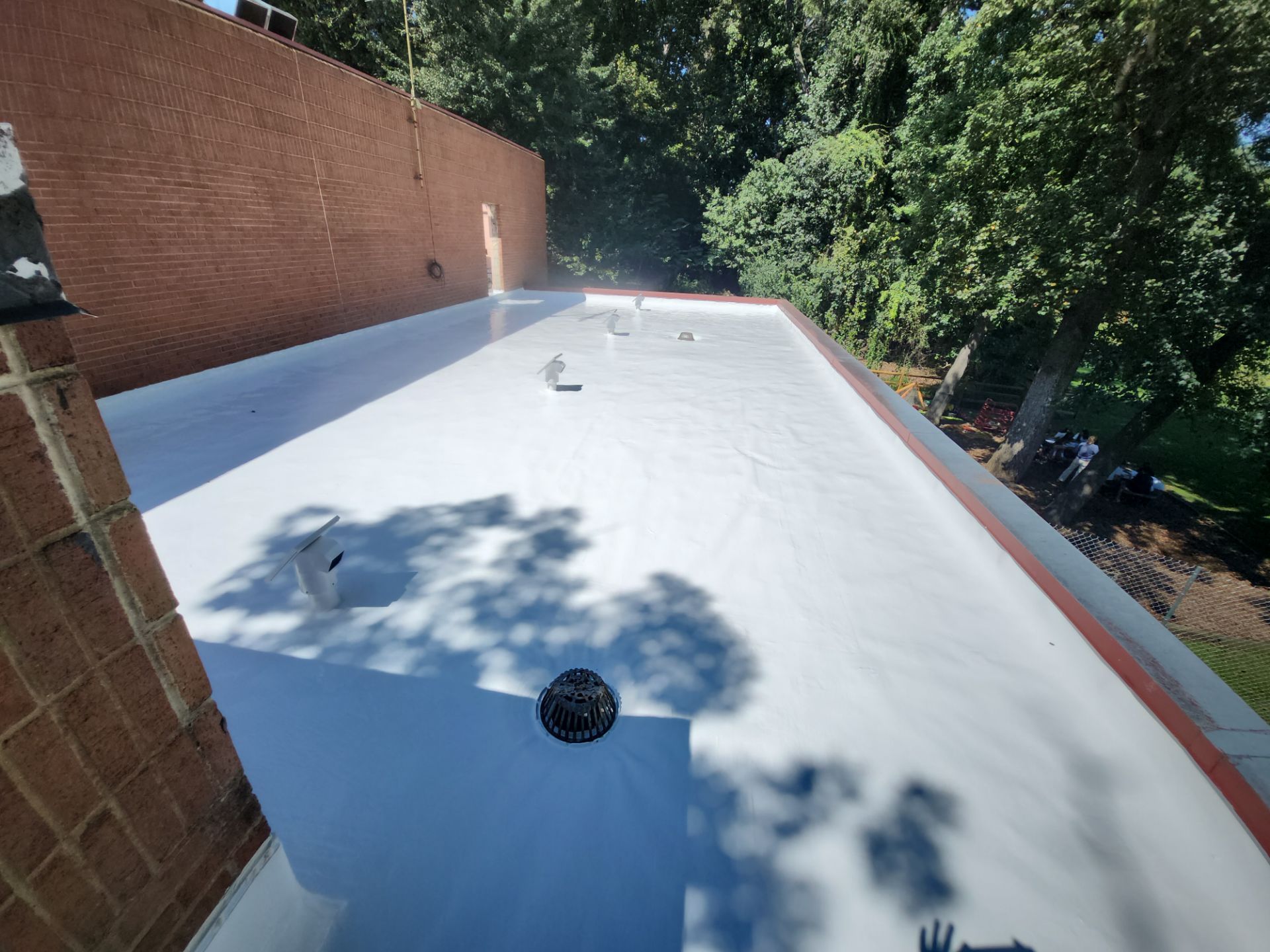 Roof Installation using Silicone TPO by ExteriorPros