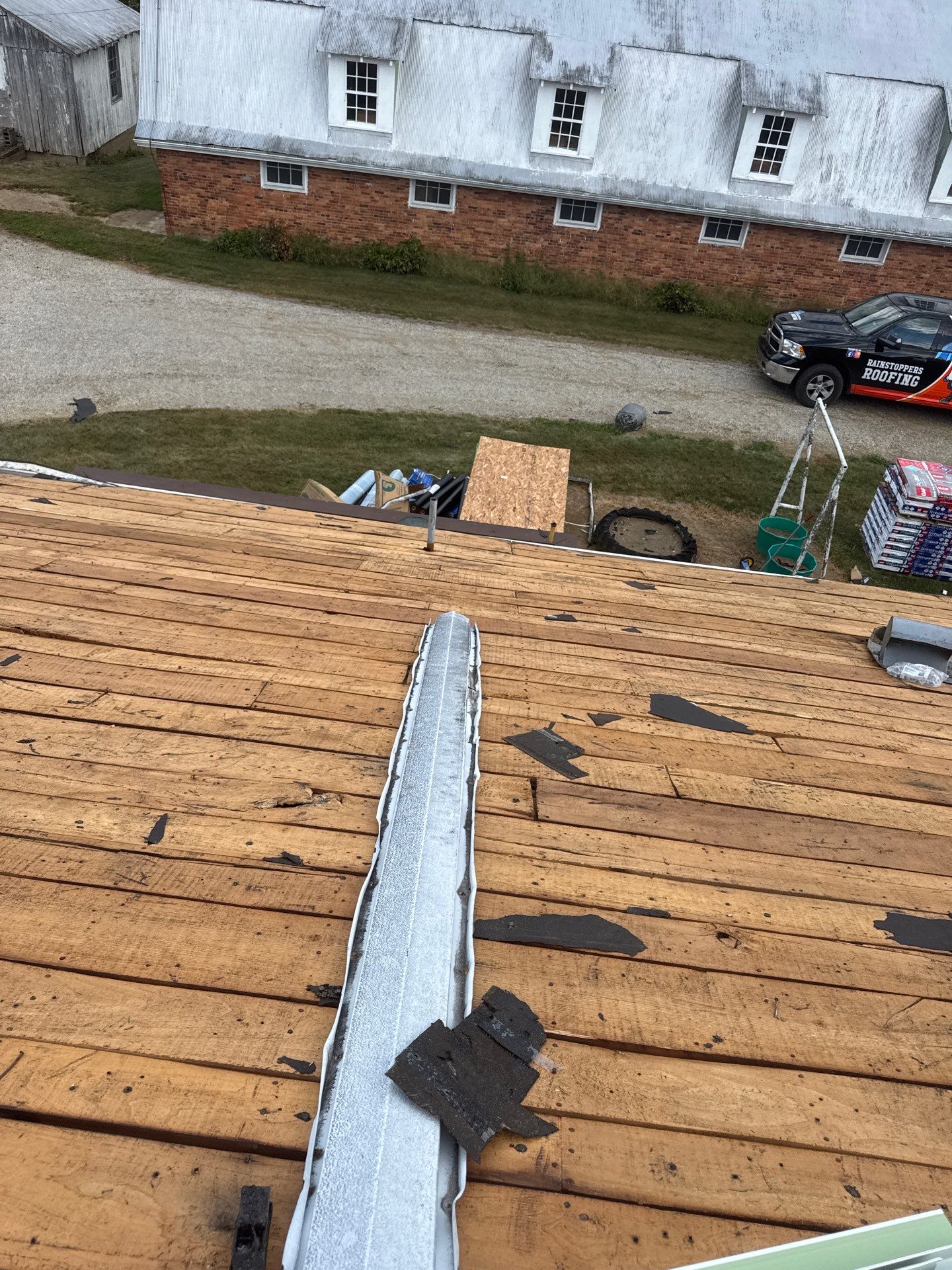 Residential Roofing Installation using GAF Timberline HDZ Charcoal by Rainstoppers Roofing