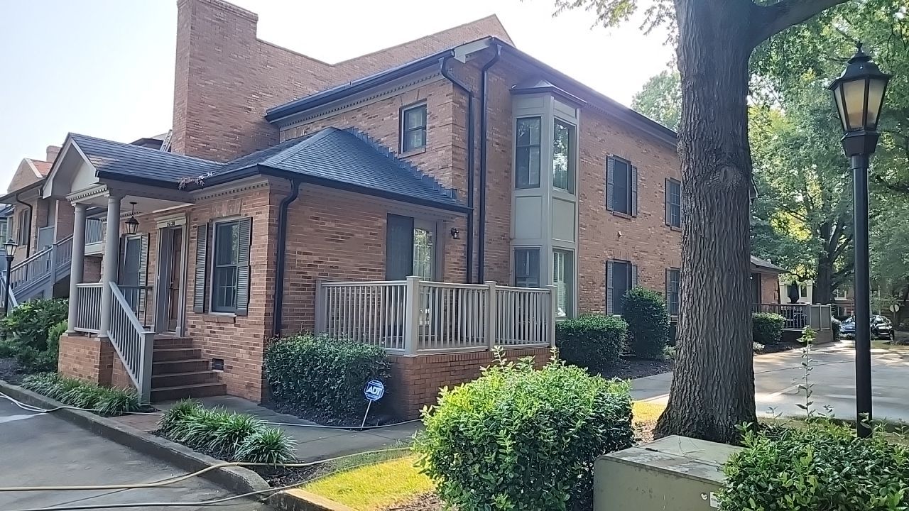 building clean using cleaner by Power Wash Masters LLC