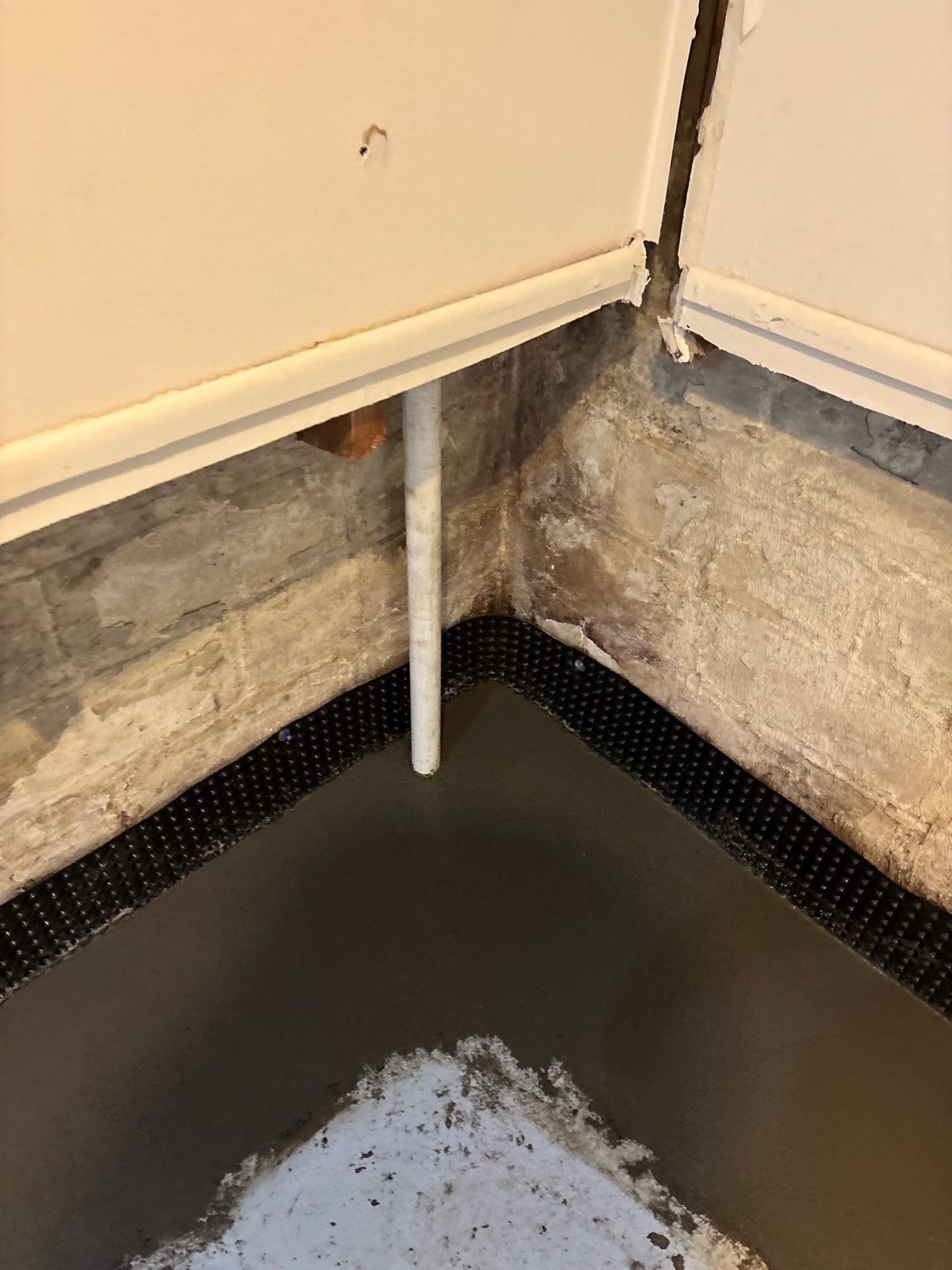 Interior Drain Tile & Sump Pump Installation in St. Paul, MN by Waterproofing Northeast