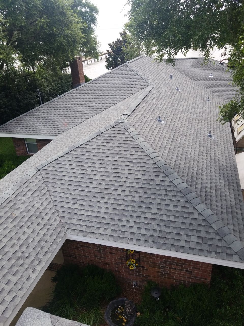 Residential Roofing Installation using Roof Replacement by American Roofing & Construction LLC