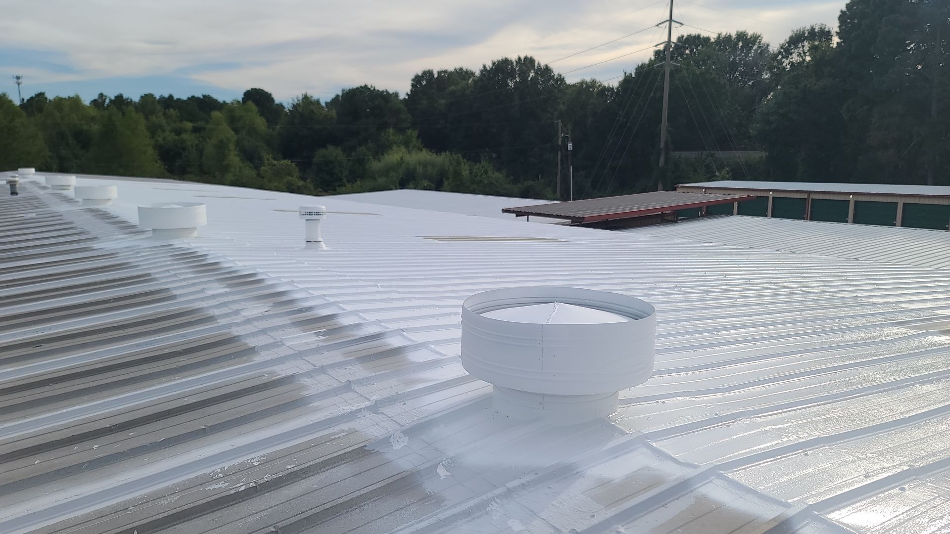 Commercial Metal Restoration System using Aldocoat Coatings by Hostetler Roofing