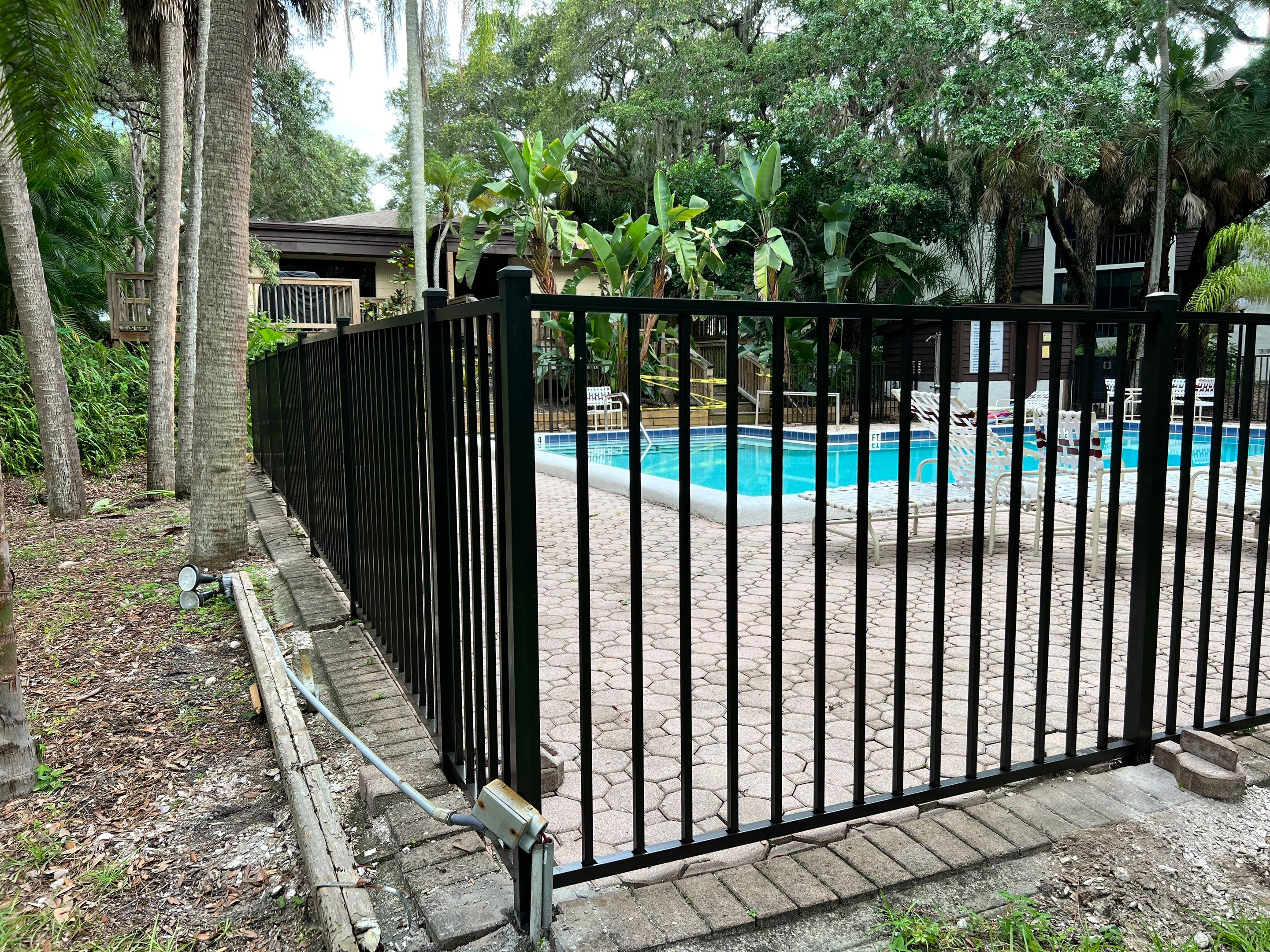 Sarasota, FL Commercial Aluminum Pool Fence & Shadowbox Wood Fence  by Asap fence and gates, LLC