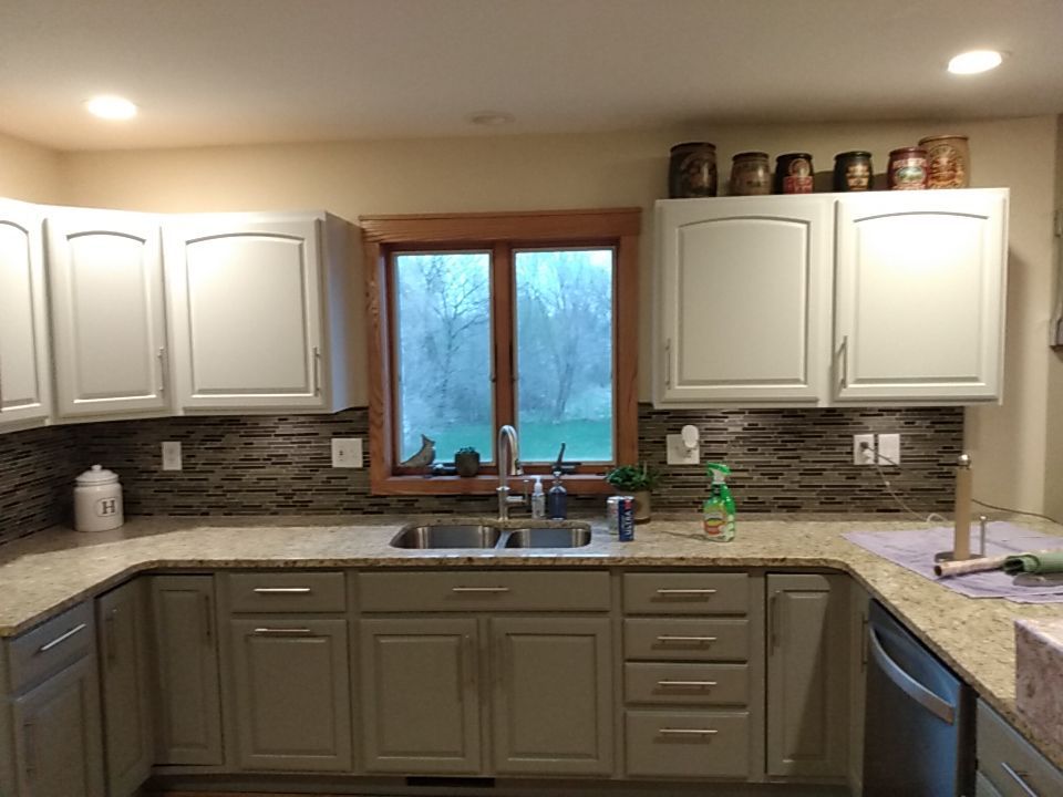 Kitchen cabinet repaint by Cutting edge painting 