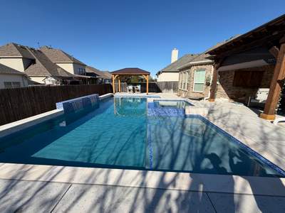 Geometric Pool with Raised Spa and Tanning Ledge