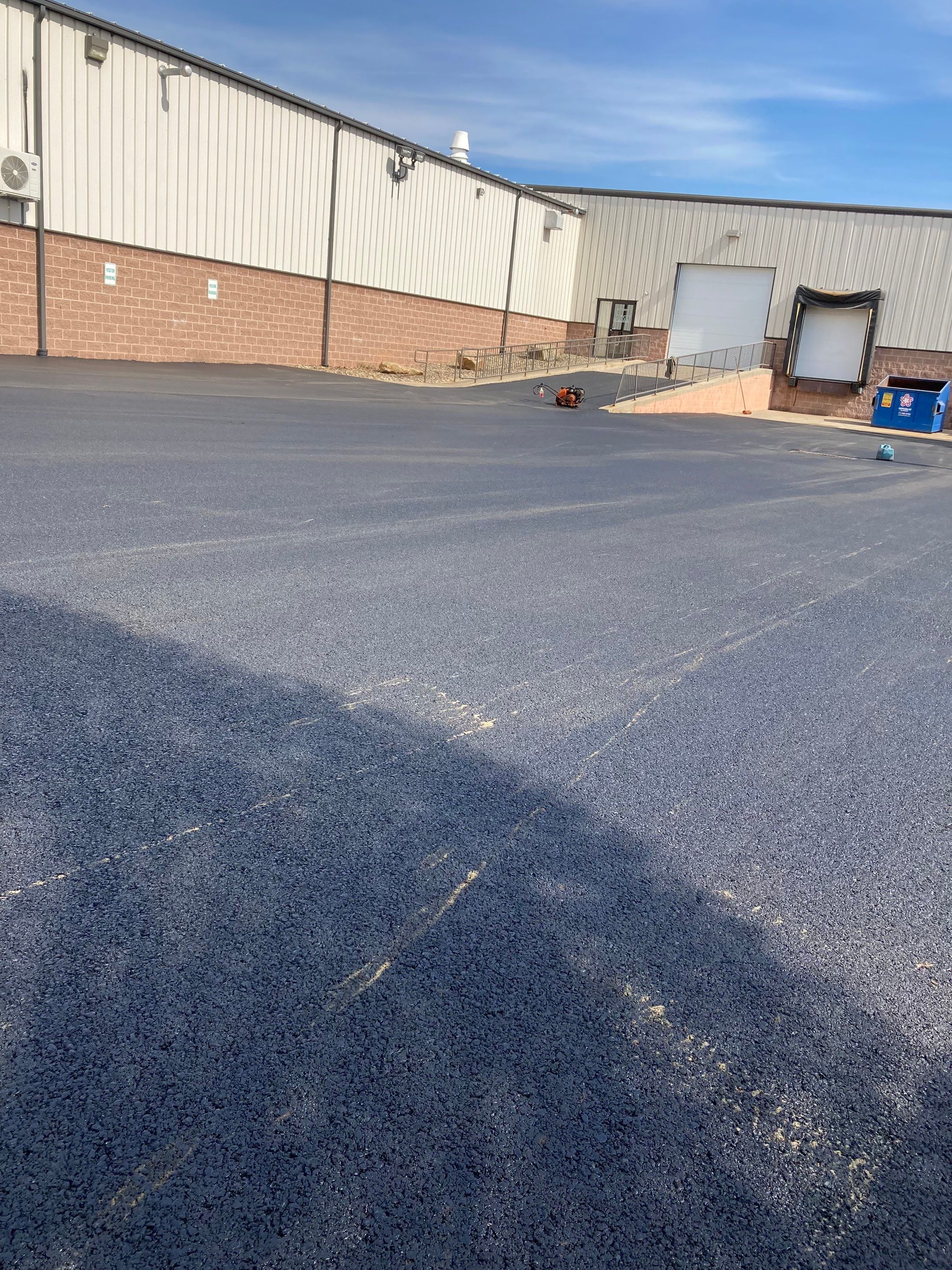 Asphalt Resurface Commercial Park Lot using asphalt by Brant's Asphalt