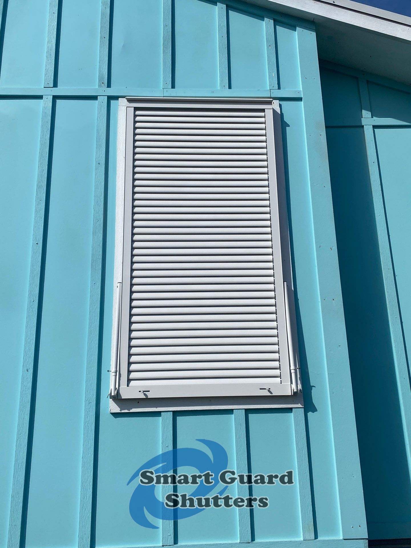 Impact Bahamas in Signal White by Smart Guard Shutters