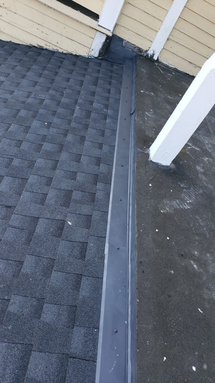 Residential Roofing Installation using Roof Replacement by American Roofing & Construction LLC