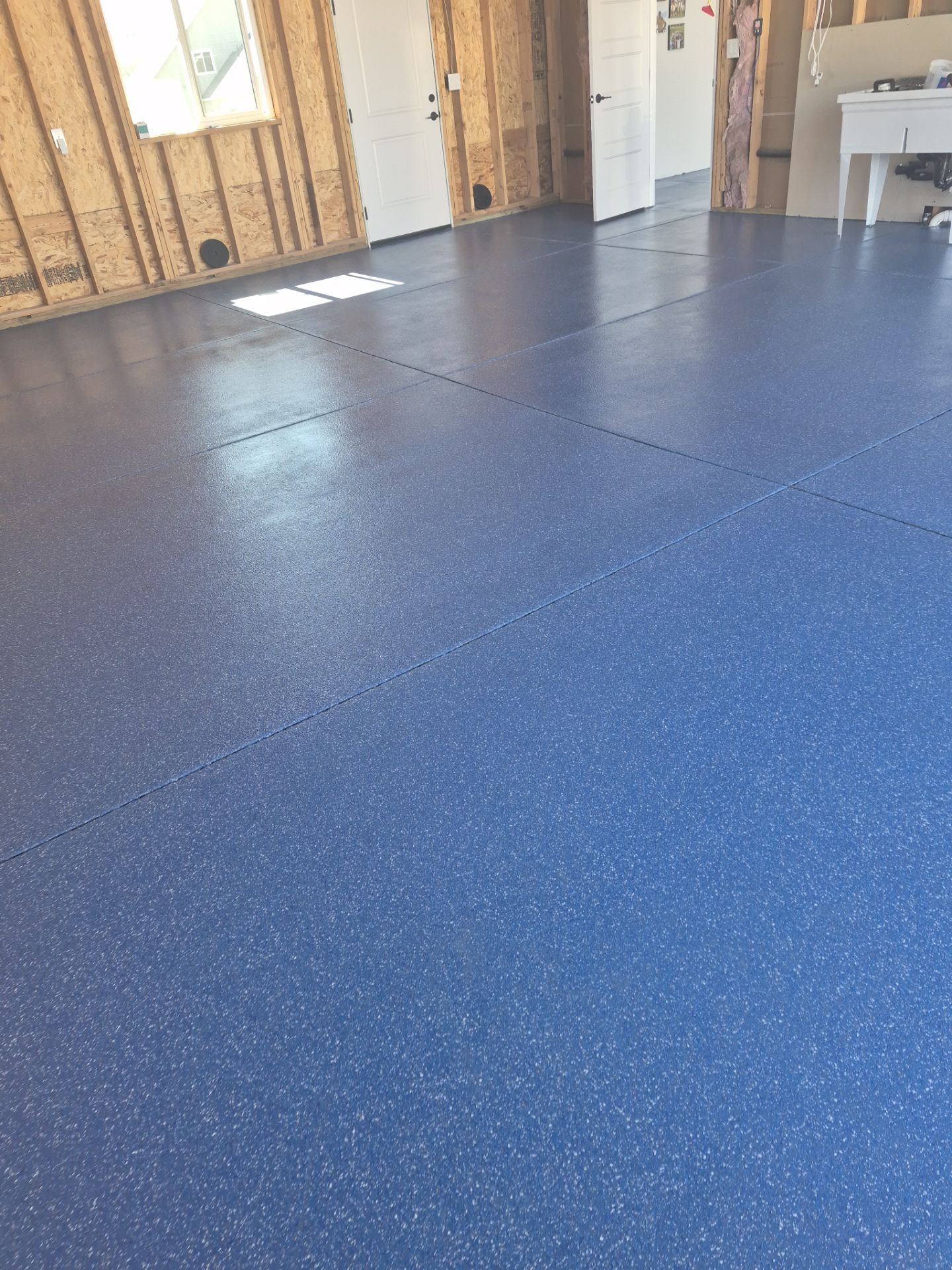 Custom Ocean Hybrid Polyaspartic Garage Floor Coating in Kennewick by Croc Coatings, LLC