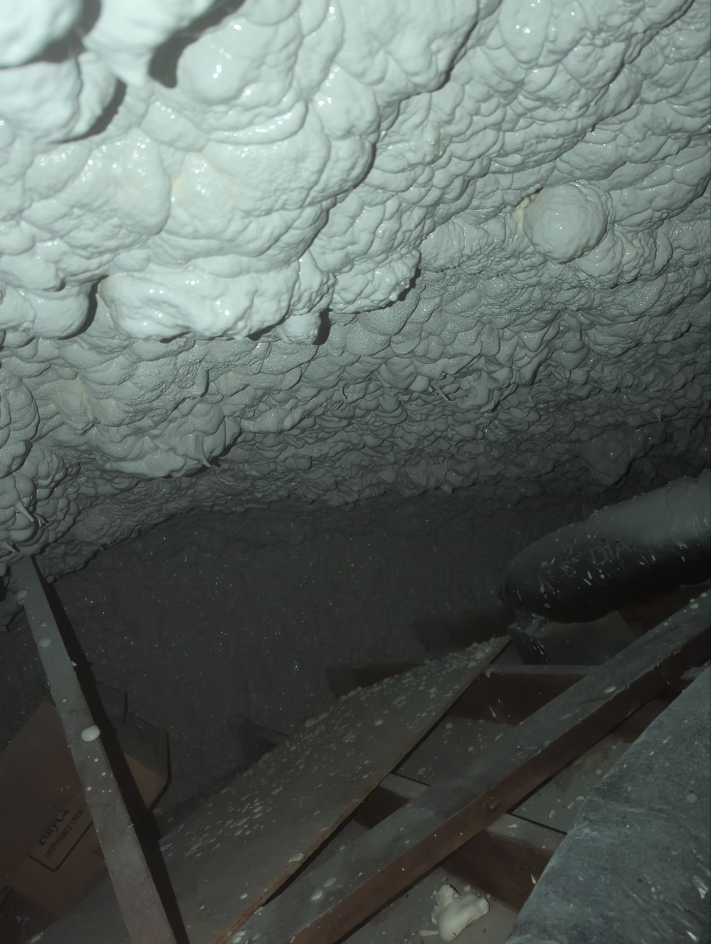 Attic Retrofit using open cell spray foam by NYS Foam & Energy