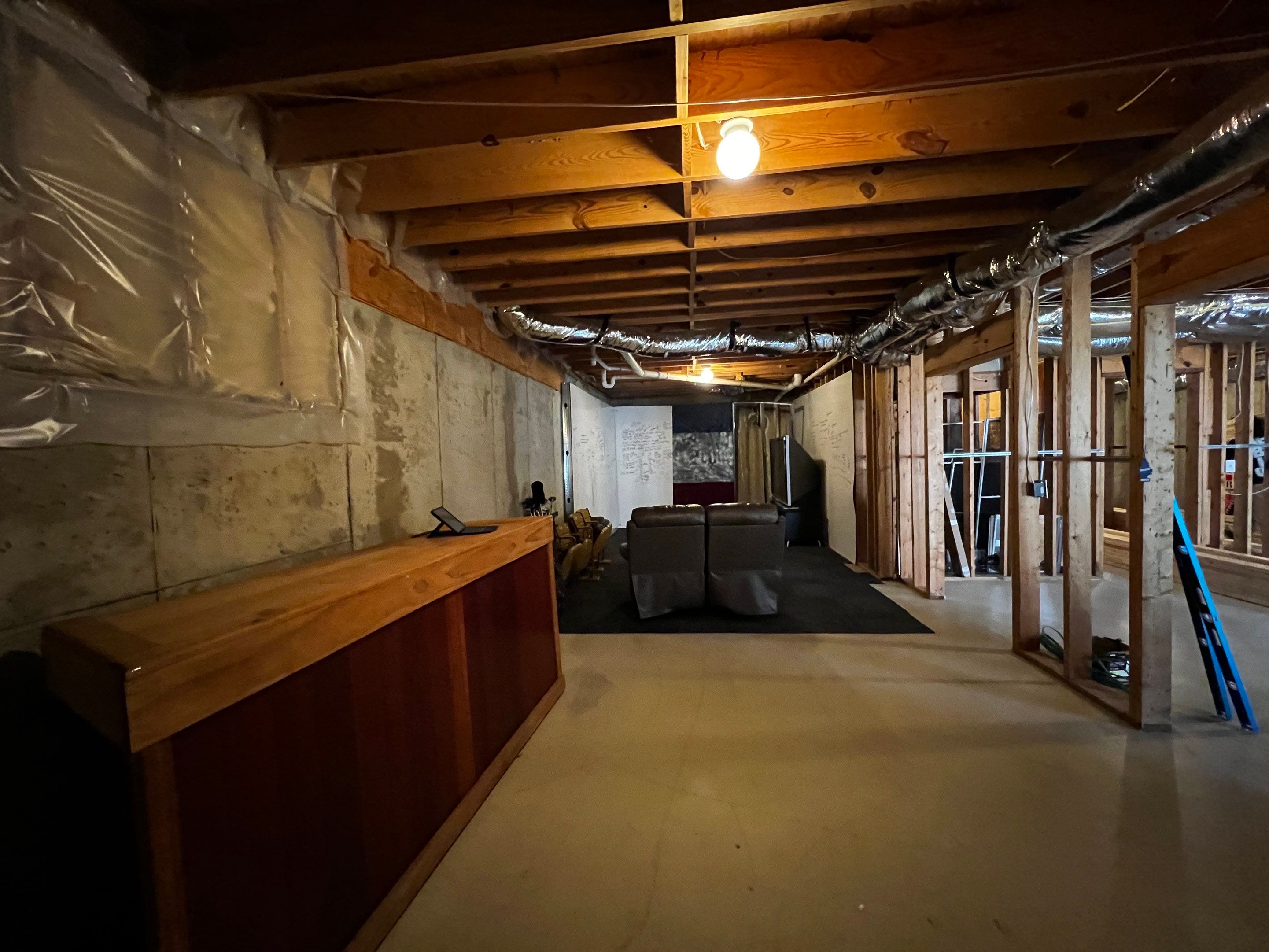 Custom Basement Remodeling With Home Theater and Bar in Woodstock by Swift Home Renovations