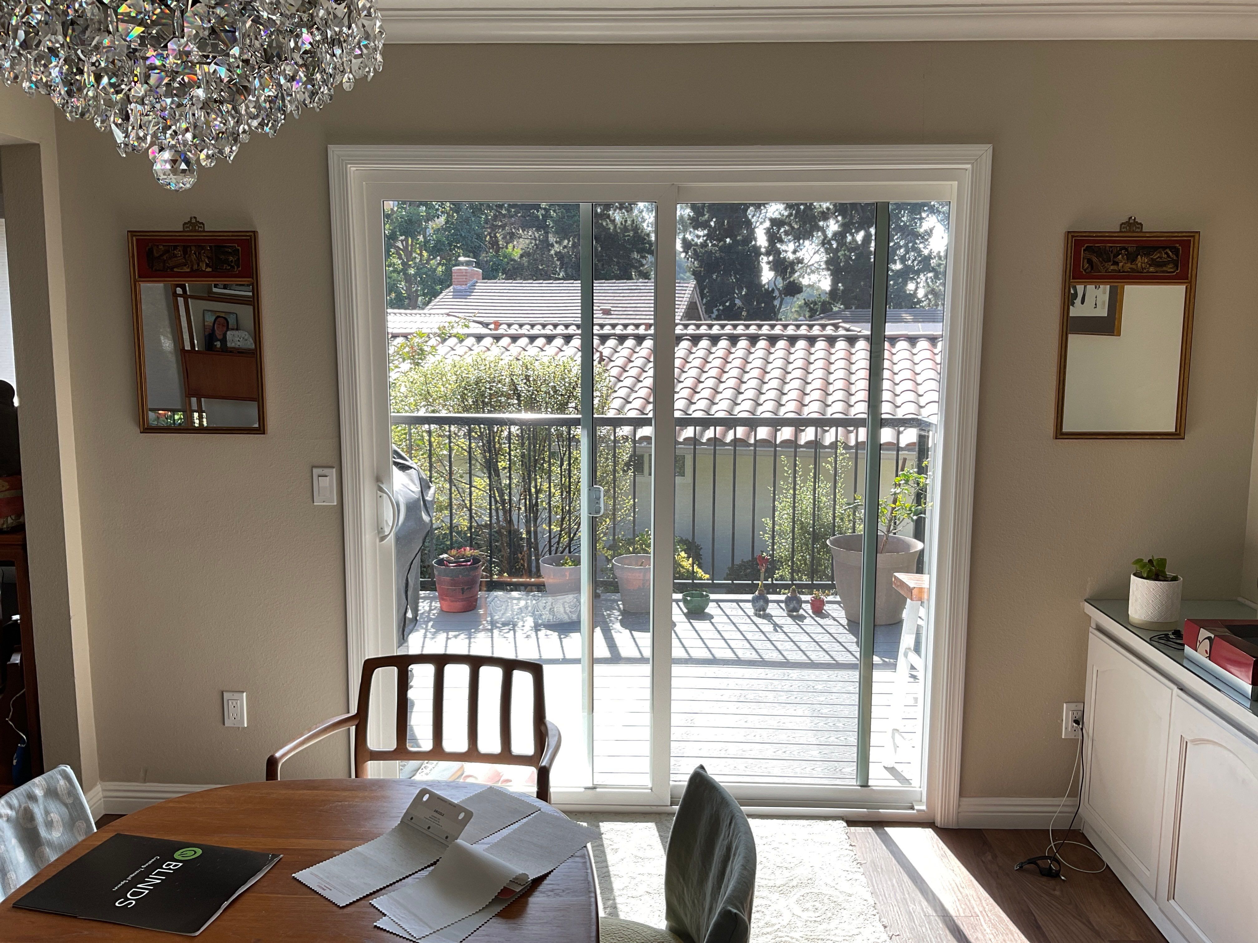 Custom Roller Shade and Floral Pattern Window Covering Installation in Solana Beach by Q Blinds