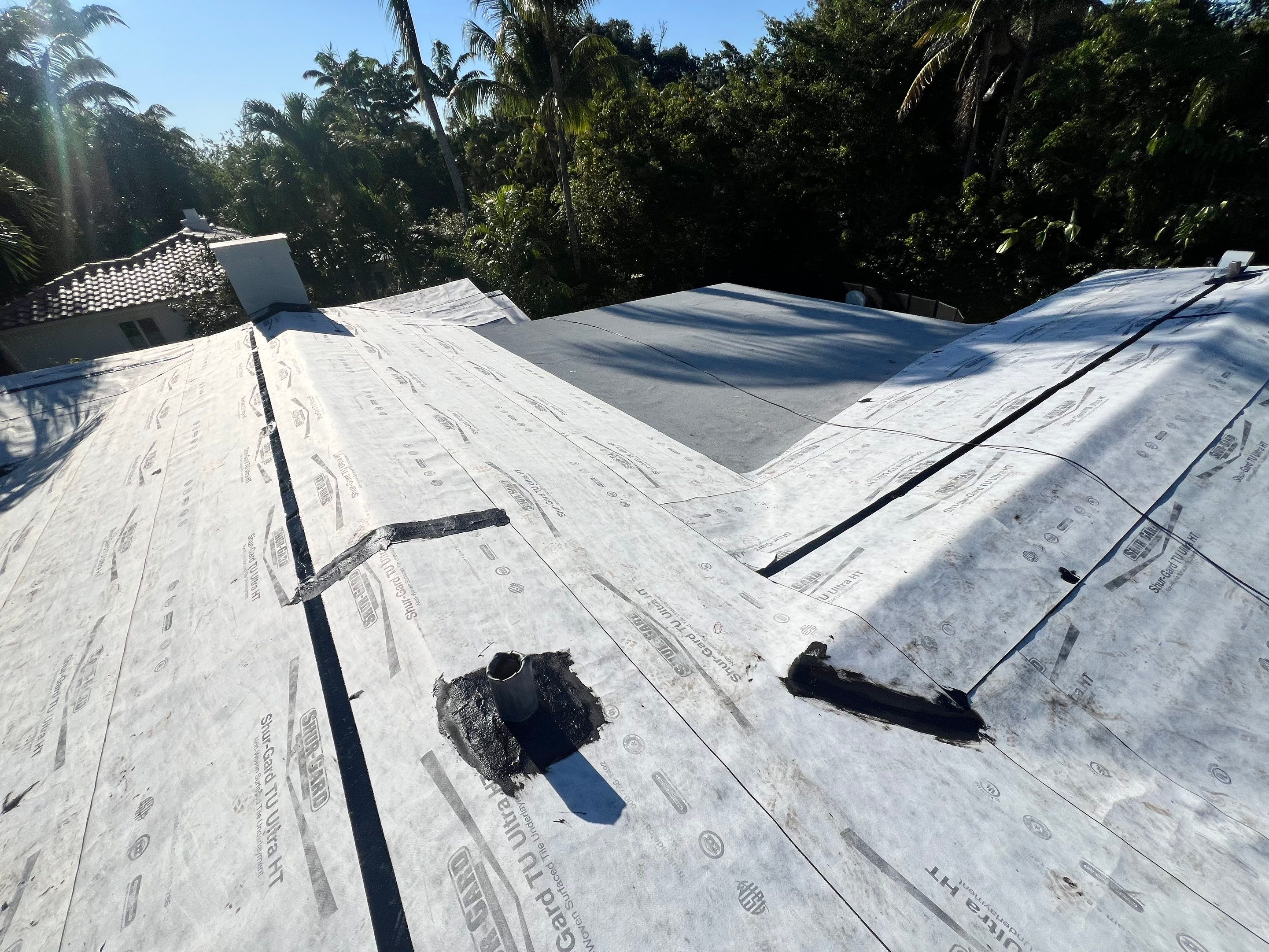 Chimney Roof Flashing Repair and New Roof by The Goat Contractor ( Giampri Corp)