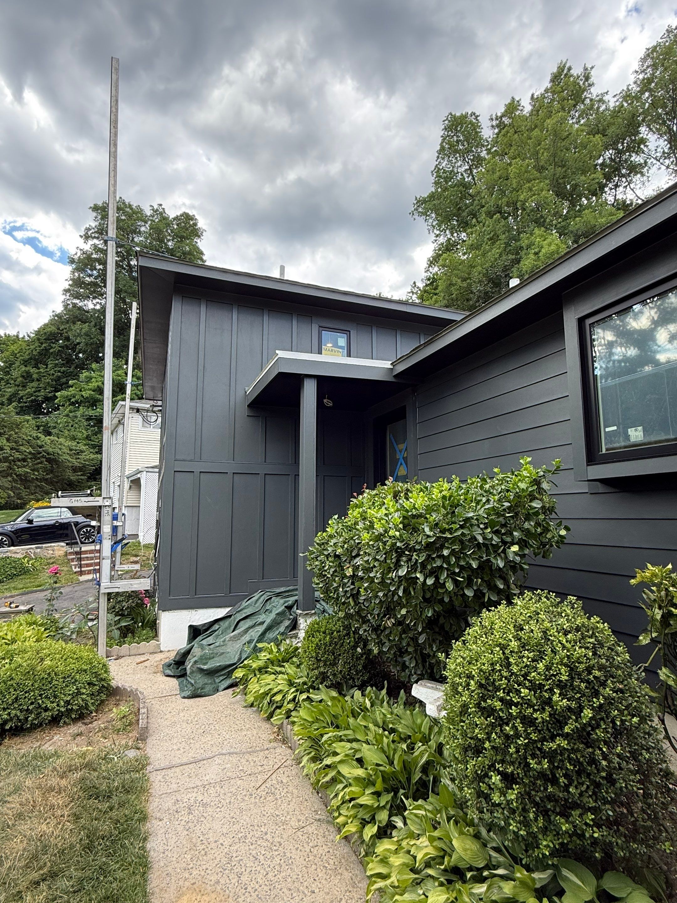 James Hardie Charcoal Board & Batten in Greenwich, CT by Ideal Siding - Westchester