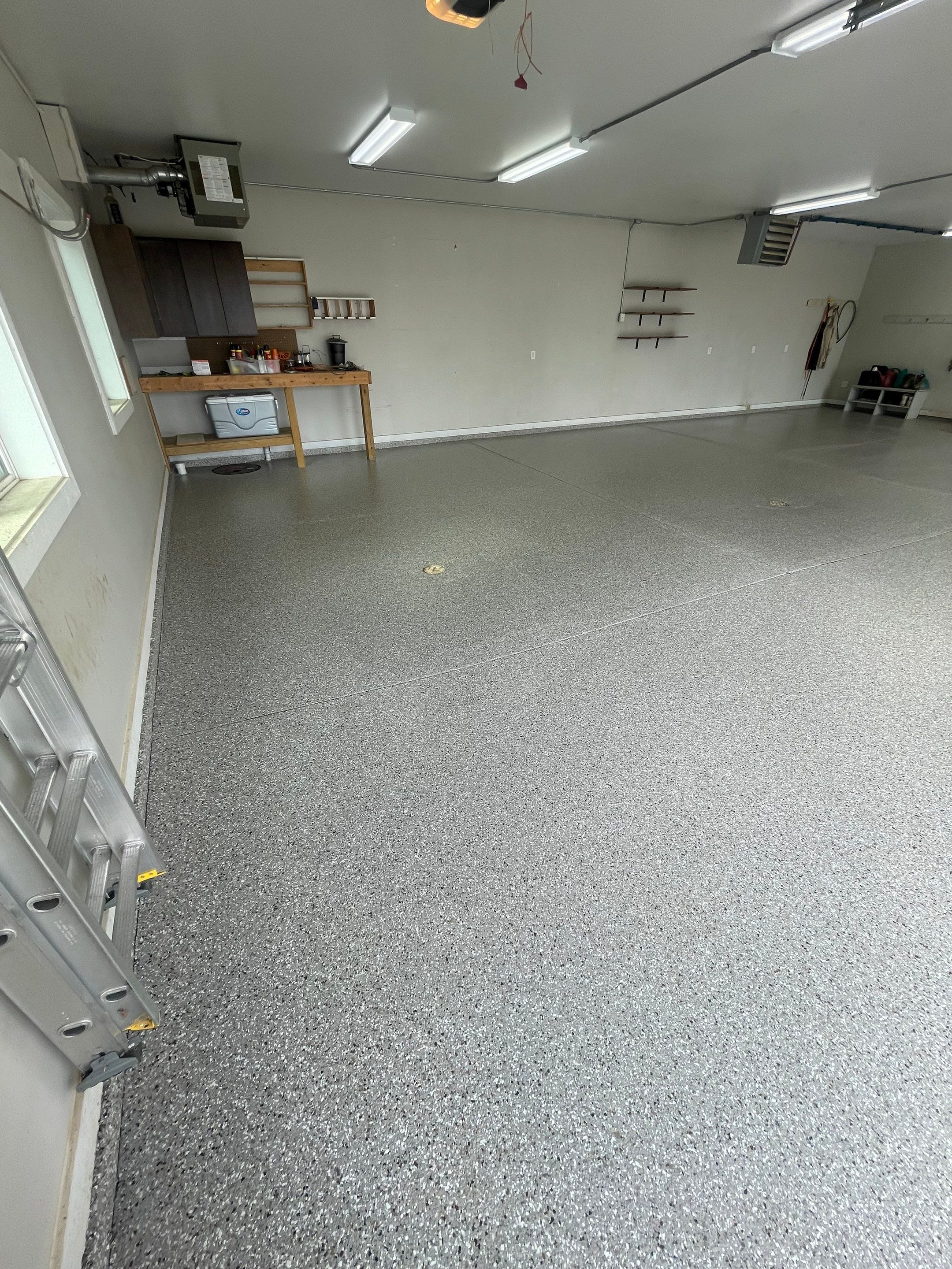 Grey Speckled Polyuera Garage Floor Coating for Hartford Three-Car Garage by Select Painting, Coatings & Garage Cabinets