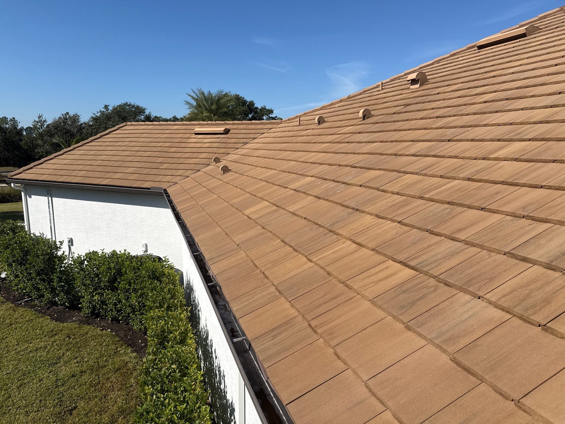 Flat Tile Roof, Paver Pool Deck & Driveway Cleaning | Cove at Twin Rivers, Parrish FL by Sunshine AquaWash