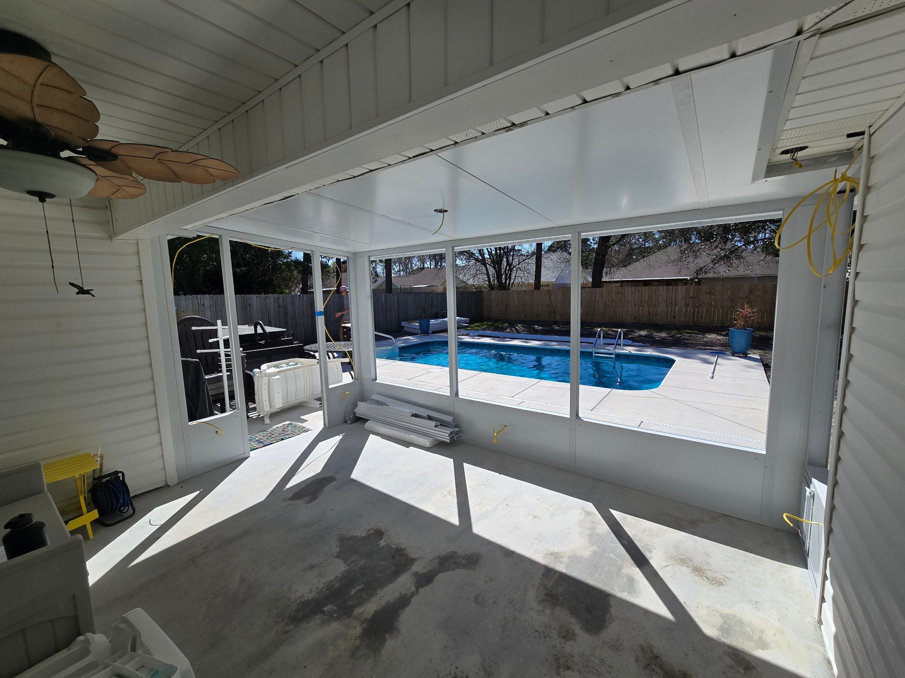 Poolside Glass Room in Gulf Breeze by Titan Sunrooms