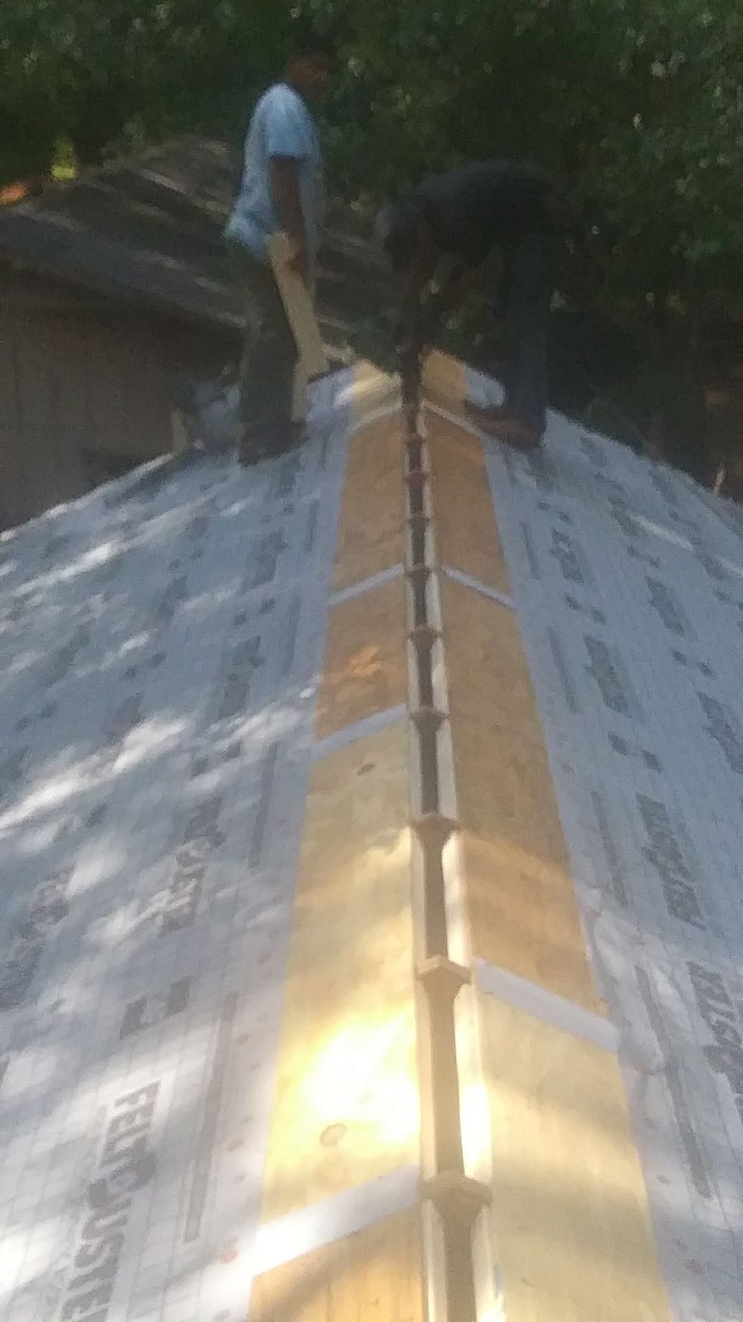 Residential Roofing Installation using Metal roofing by American Roofing & Construction LLC