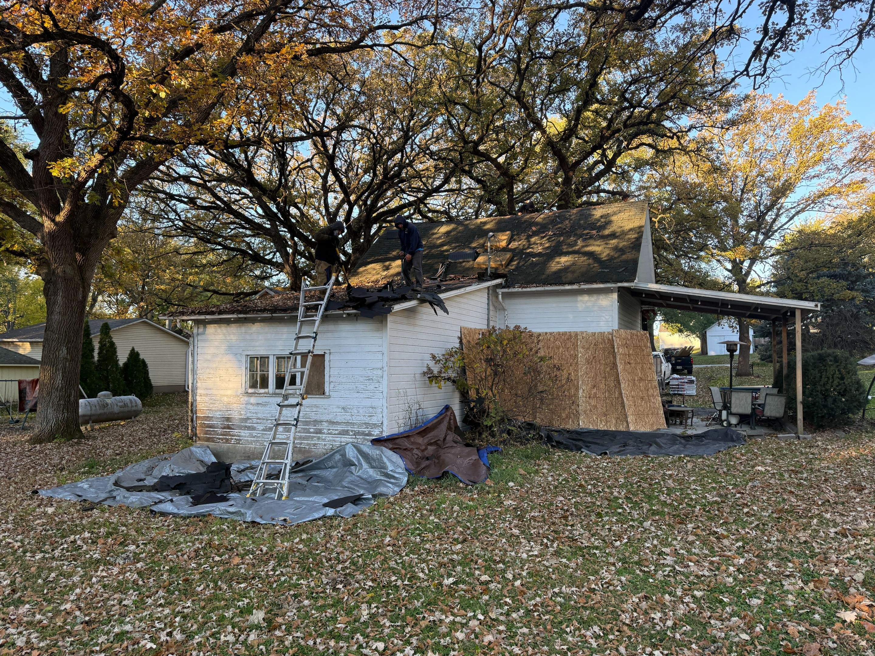 Garage Roof Replacement and Gutter Guard Installation in Red Oak by Star Home