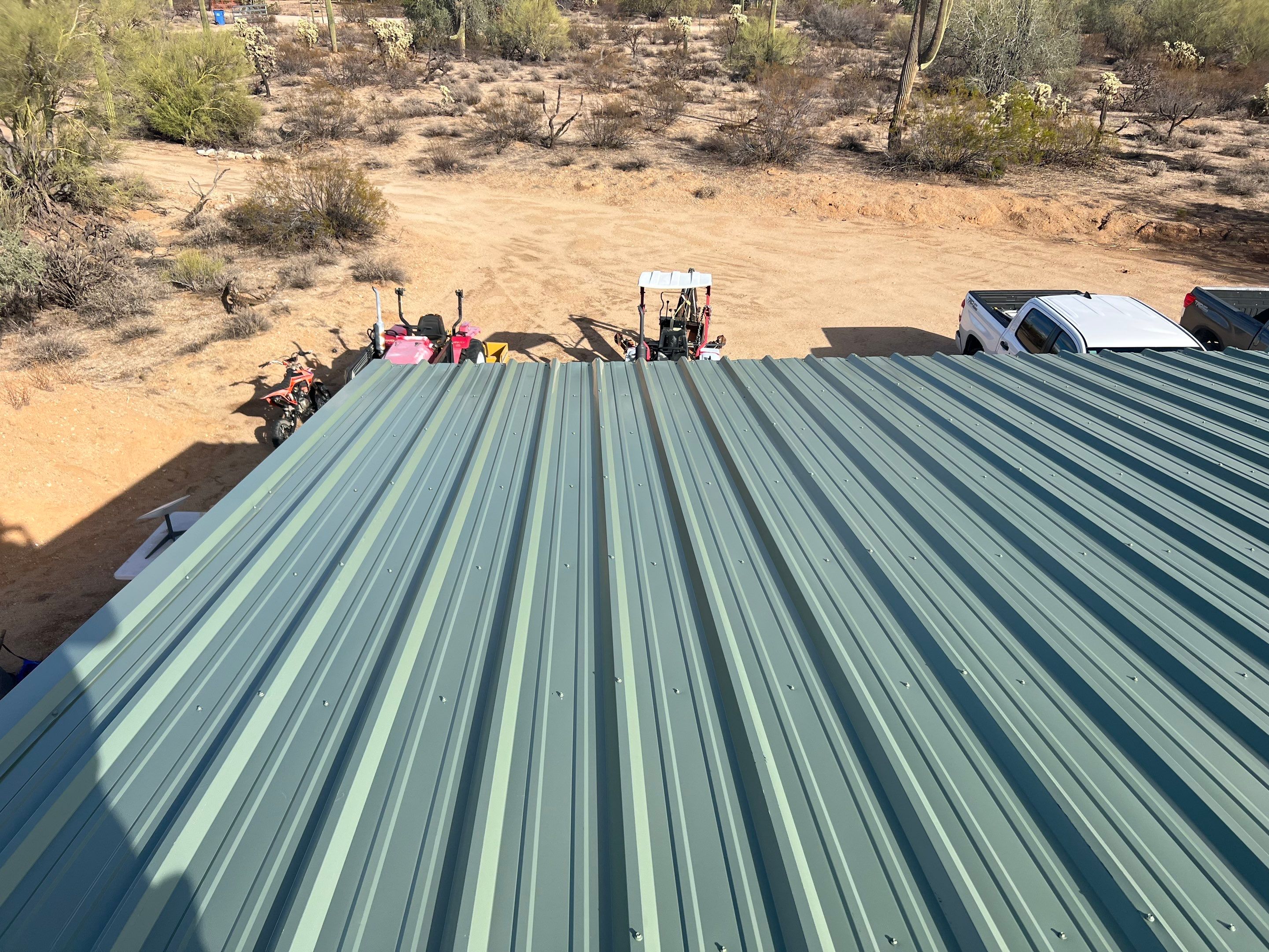 Sage Green Exposed Fastener by Reimagine Roofing