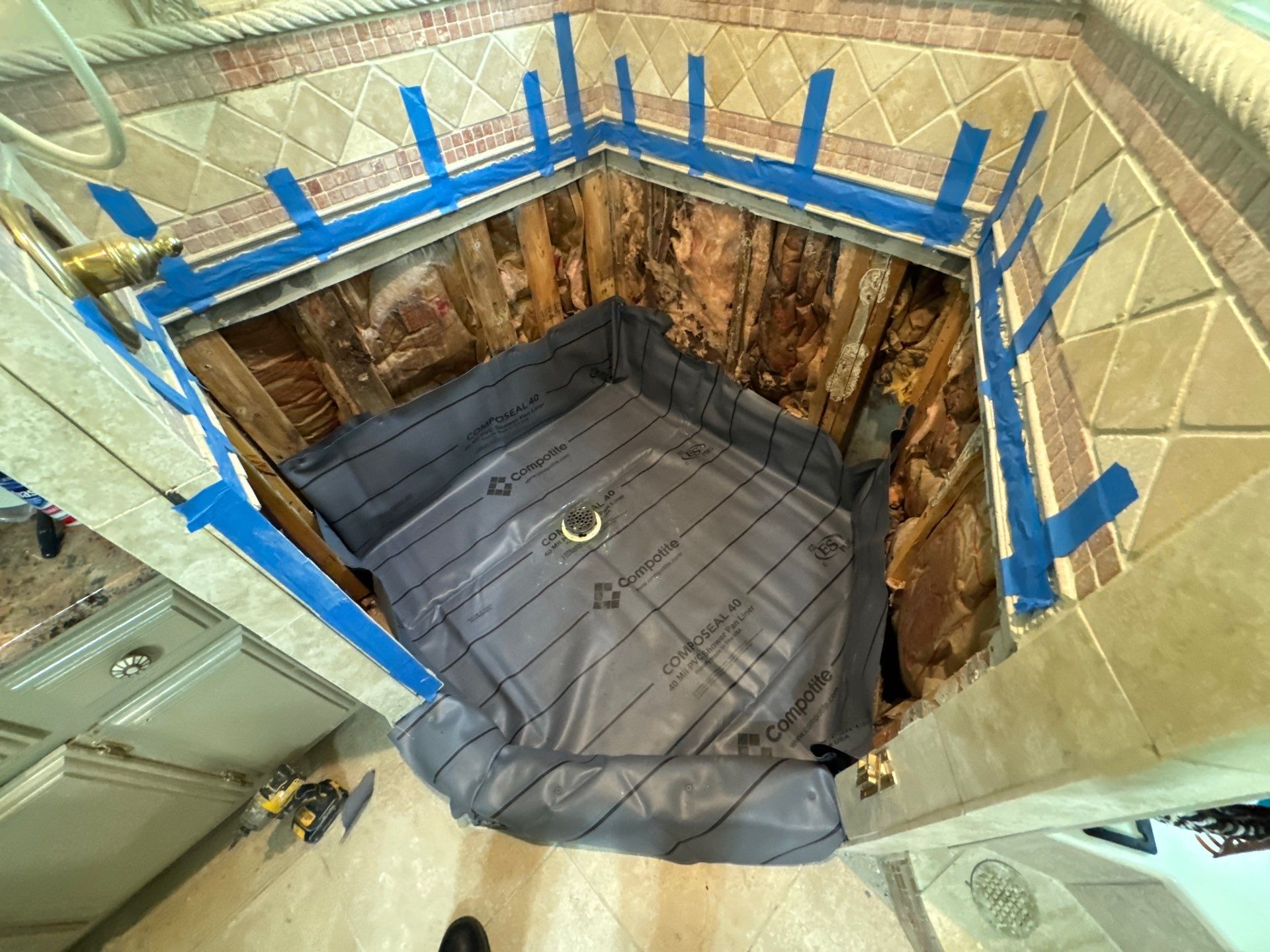 Shower floor repair by Prudencio