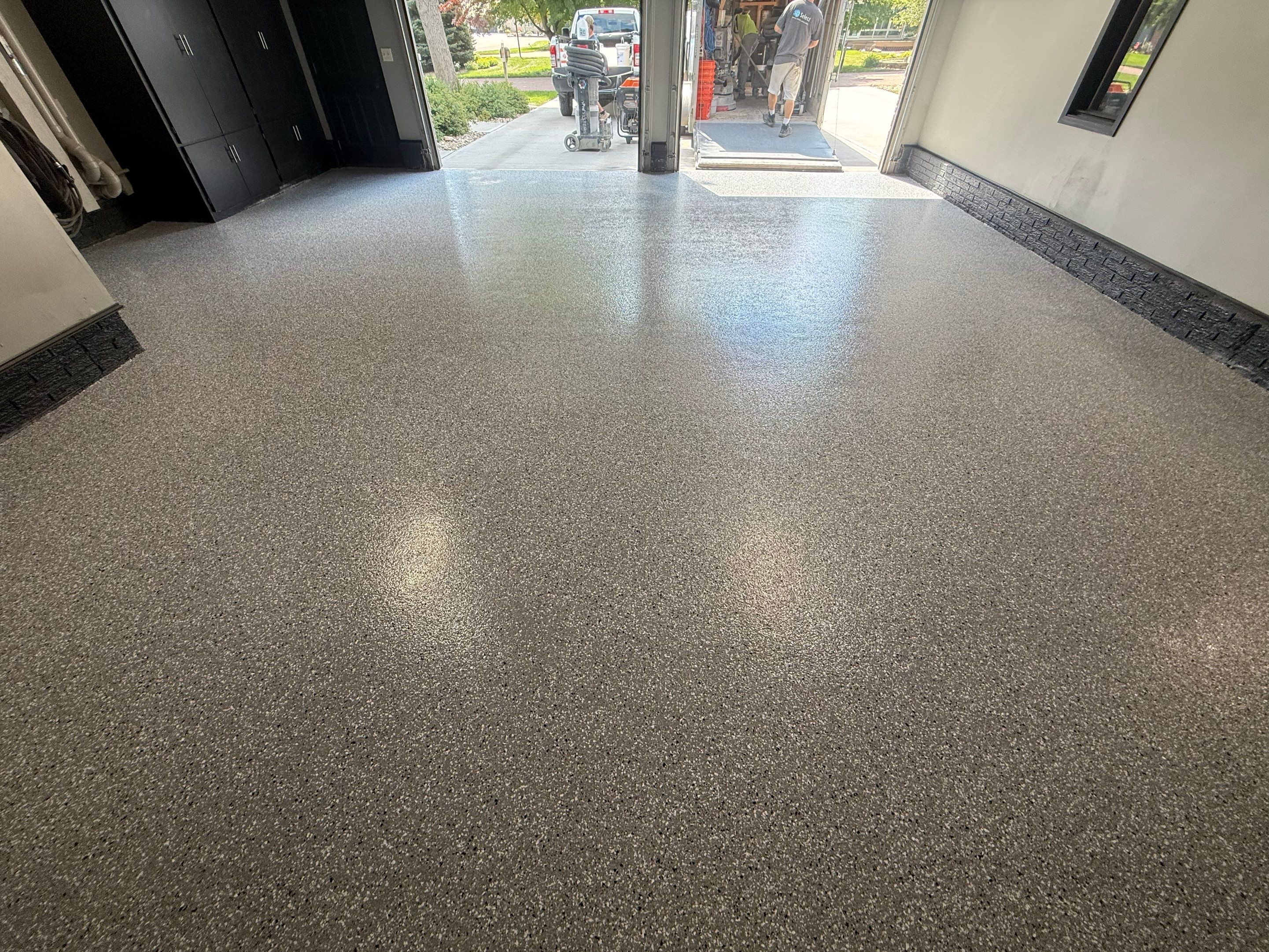 Garage Floor and Textured Pool Deck Coating in Sioux Falls by Select Painting, Coatings & Garage Cabinets